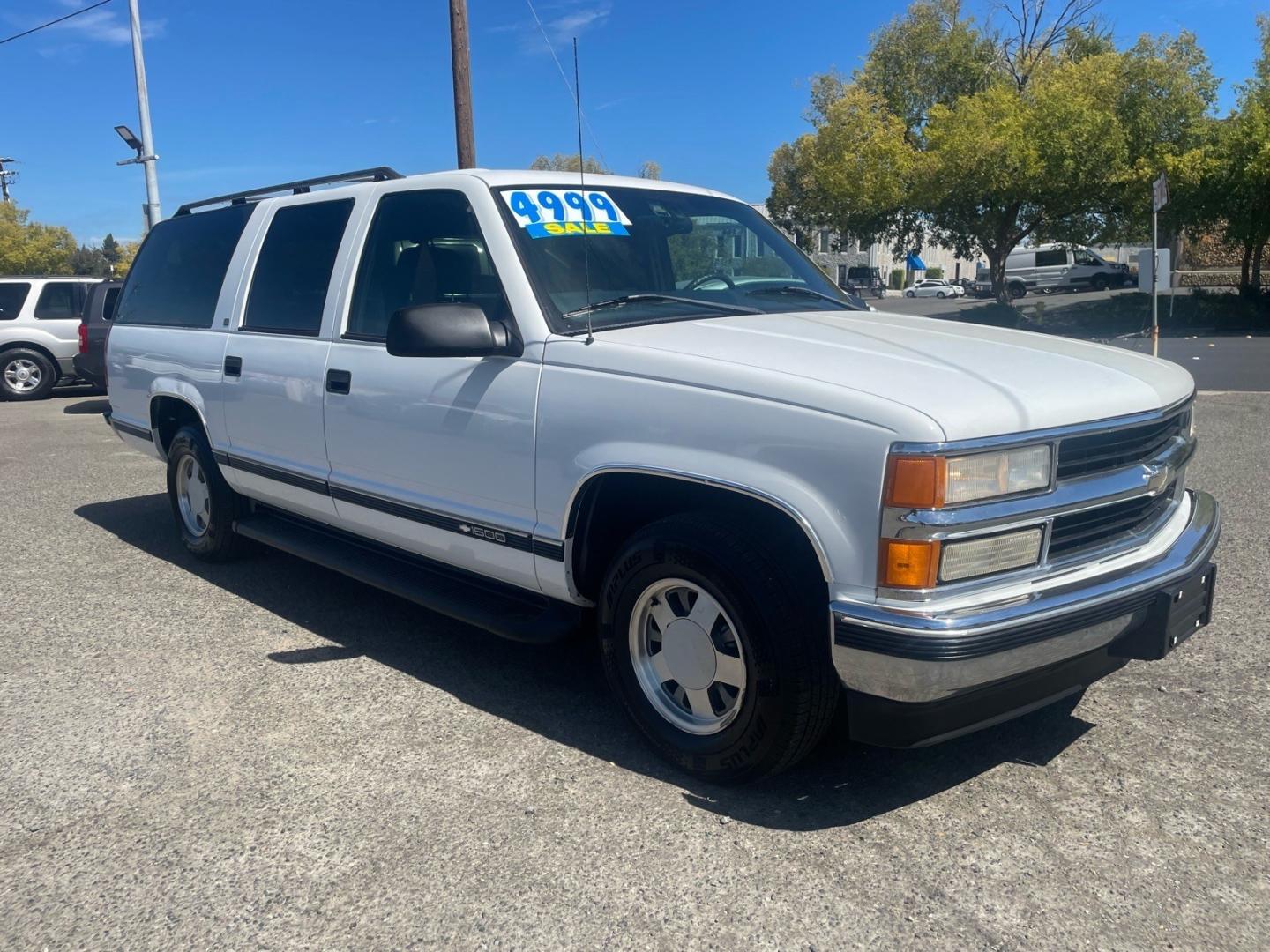 1999 White Chevrolet Suburban LT (1GNEC16R5XJ) with an 8 Cylinder Other engine, 5-Speed Automatic transmission, located at 800 Riverside Ave, Roseville, CA, 95678, 916-773-4549 & Toll Free: 866-719-4393, 38.732265, -121.291039 - LT 8 PASSENGER NEW TIRES LOW MILES CLEAN CARFAX- Photo#1