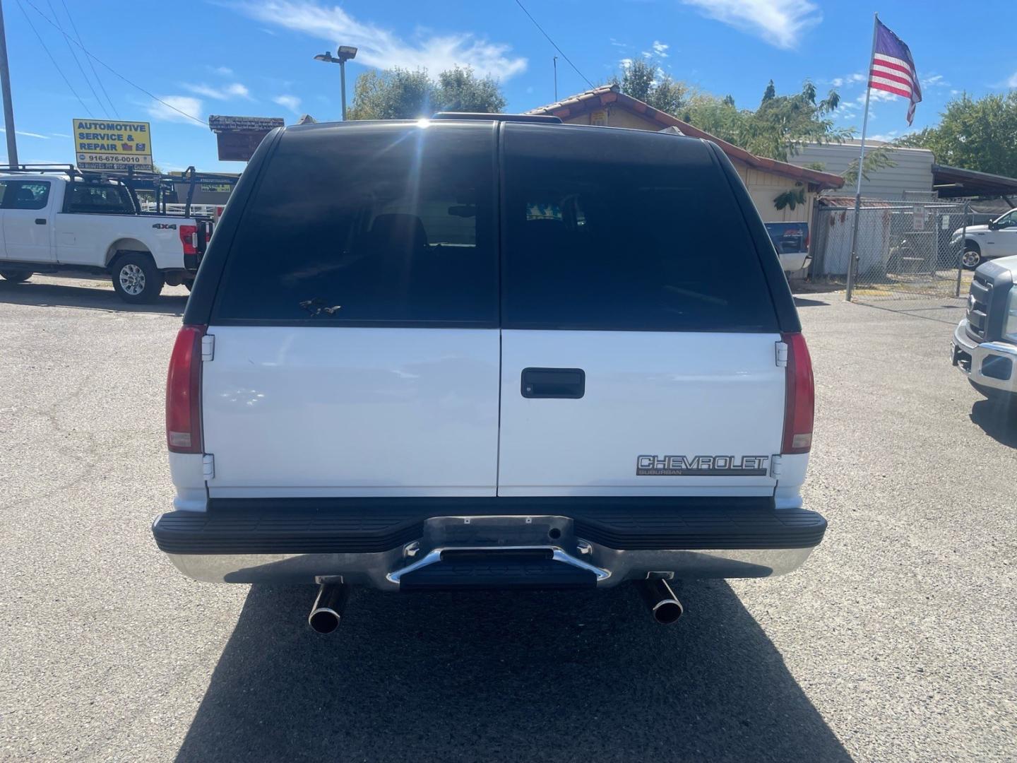 1999 White Chevrolet Suburban LT (1GNEC16R5XJ) with an 8 Cylinder Other engine, 5-Speed Automatic transmission, located at 800 Riverside Ave, Roseville, CA, 95678, 916-773-4549 & Toll Free: 866-719-4393, 38.732265, -121.291039 - LT 8 PASSENGER NEW TIRES LOW MILES CLEAN CARFAX- Photo#7