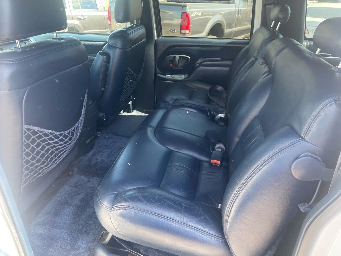 1999 White Chevrolet Suburban LT (1GNEC16R5XJ) with an 8 Cylinder Other engine, 5-Speed Automatic transmission, located at 800 Riverside Ave, Roseville, CA, 95678, 916-773-4549 & Toll Free: 866-719-4393, 38.732265, -121.291039 - LT 8 PASSENGER NEW TIRES LOW MILES CLEAN CARFAX- Photo#10