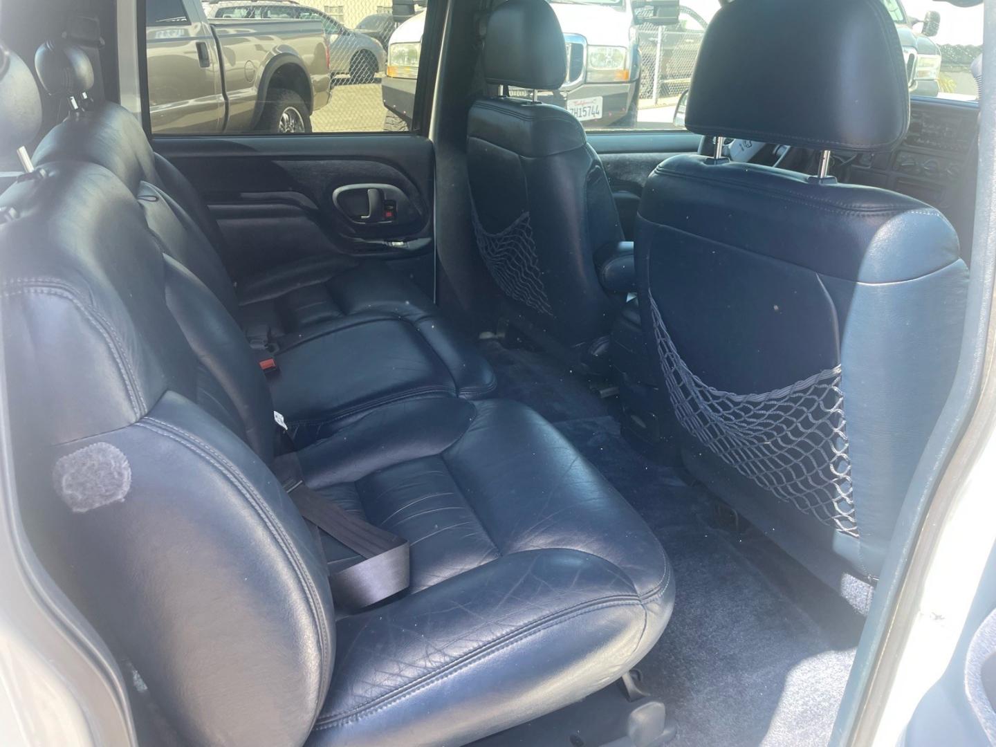 1999 White Chevrolet Suburban LT (1GNEC16R5XJ) with an 8 Cylinder Other engine, 5-Speed Automatic transmission, located at 800 Riverside Ave, Roseville, CA, 95678, 916-773-4549 & Toll Free: 866-719-4393, 38.732265, -121.291039 - LT 8 PASSENGER NEW TIRES LOW MILES CLEAN CARFAX- Photo#13