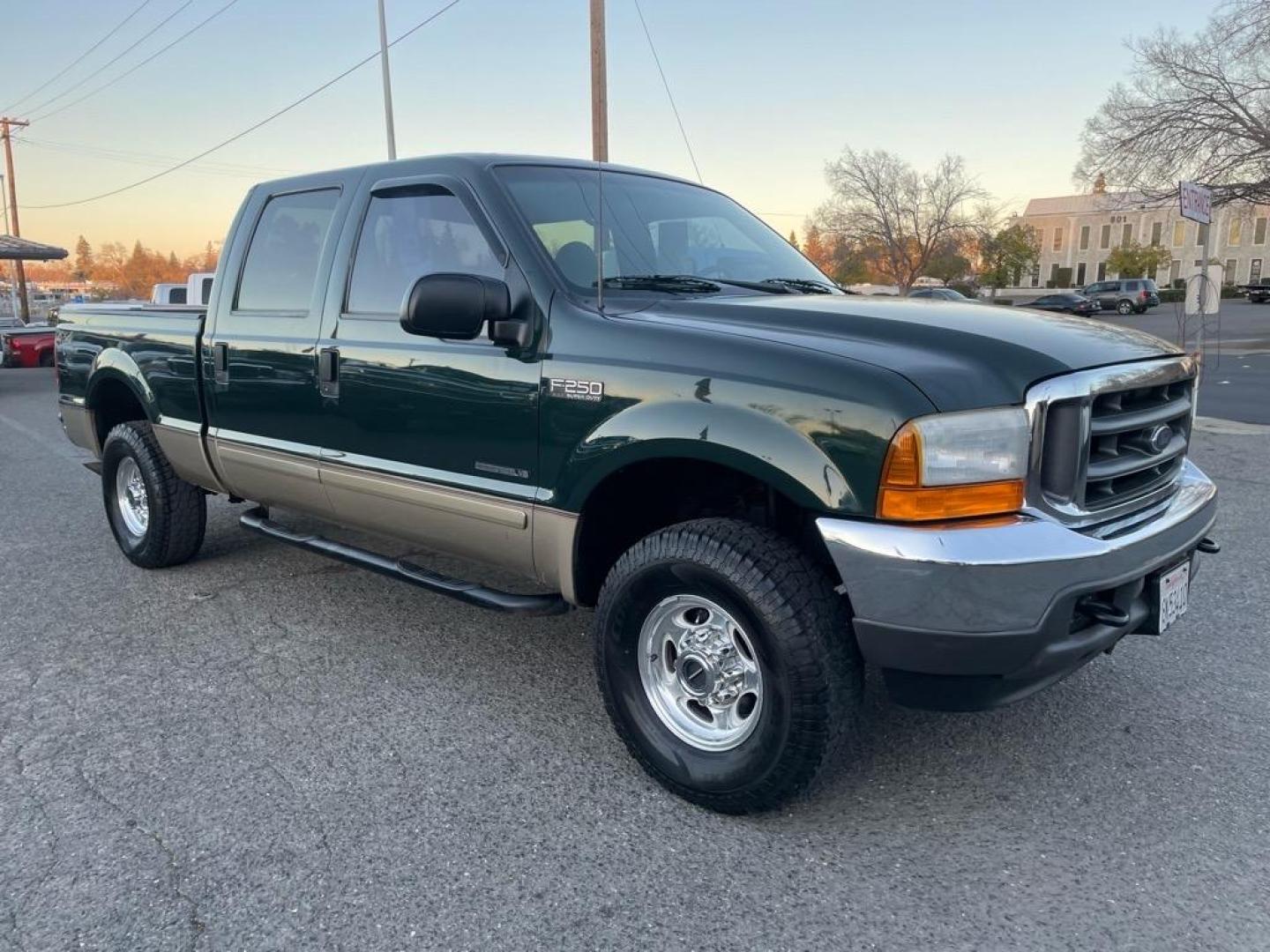 2001 Dark Highland Green Clearcoat Metallic Ford F-250 Super Duty XLT (1FTNW21F21E) with an Power Stroke 7.3L Diesel Turbo V8 250hp 505ft. lbs. Other engine, 4-Speed Automatic transmission, located at 800 Riverside Ave, Roseville, CA, 95678, 916-773-4549 & Toll Free: 866-719-4393, 38.732265, -121.291039 - 7.3 DIESEL CREW CAB 4X4 OFF ROAD XLT LOW MILES CLEAN CARFAX - Photo#1