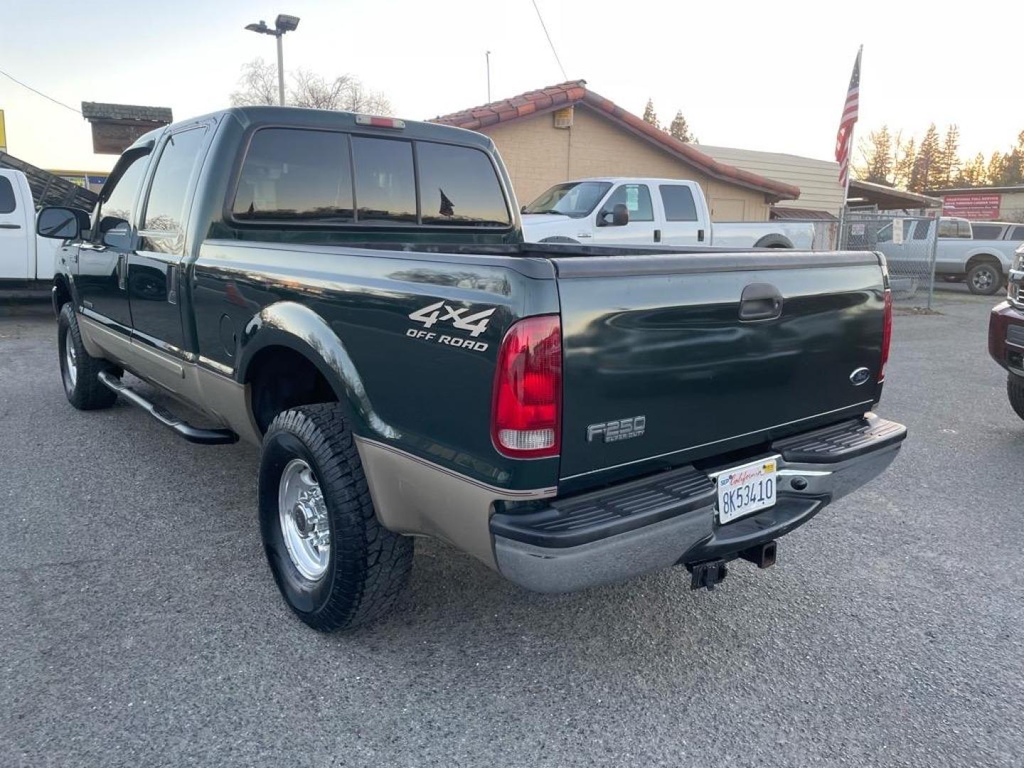2001 Dark Highland Green Clearcoat Metallic Ford F-250 Super Duty XLT (1FTNW21F21E) with an Power Stroke 7.3L Diesel Turbo V8 250hp 505ft. lbs. Other engine, 4-Speed Automatic transmission, located at 800 Riverside Ave, Roseville, CA, 95678, 916-773-4549 & Toll Free: 866-719-4393, 38.732265, -121.291039 - 7.3 DIESEL CREW CAB 4X4 OFF ROAD XLT LOW MILES CLEAN CARFAX - Photo#2