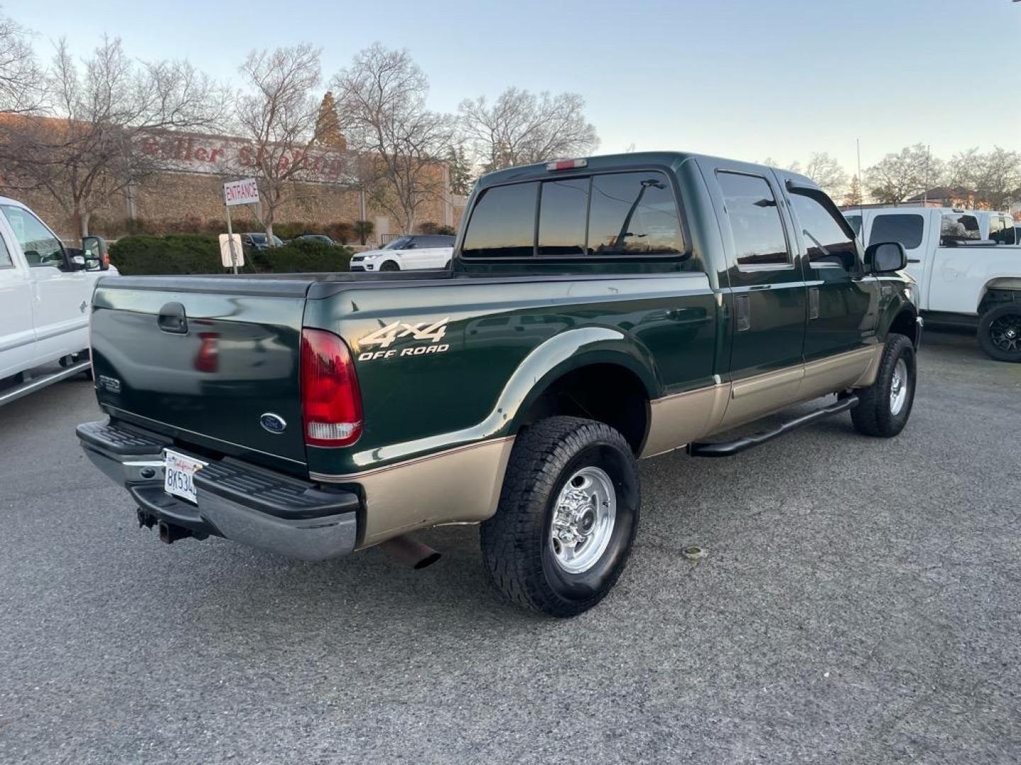 2001 Dark Highland Green Clearcoat Metallic Ford F-250 Super Duty XLT (1FTNW21F21E) with an Power Stroke 7.3L Diesel Turbo V8 250hp 505ft. lbs. Other engine, 4-Speed Automatic transmission, located at 800 Riverside Ave, Roseville, CA, 95678, 916-773-4549 & Toll Free: 866-719-4393, 38.732265, -121.291039 - 7.3 DIESEL CREW CAB 4X4 OFF ROAD XLT LOW MILES CLEAN CARFAX - Photo#3