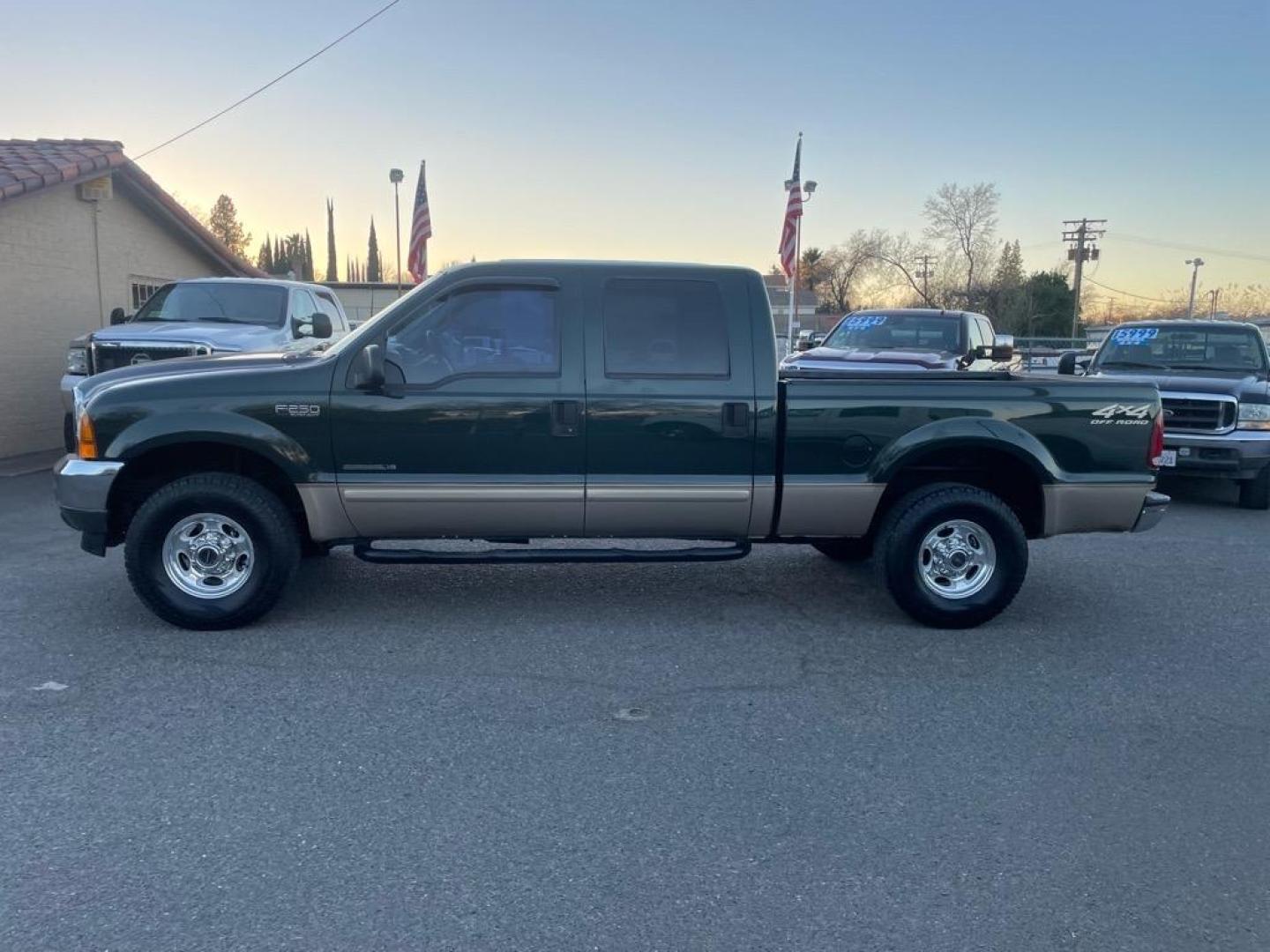 2001 Dark Highland Green Clearcoat Metallic Ford F-250 Super Duty XLT (1FTNW21F21E) with an Power Stroke 7.3L Diesel Turbo V8 250hp 505ft. lbs. Other engine, 4-Speed Automatic transmission, located at 800 Riverside Ave, Roseville, CA, 95678, 916-773-4549 & Toll Free: 866-719-4393, 38.732265, -121.291039 - 7.3 DIESEL CREW CAB 4X4 OFF ROAD XLT LOW MILES CLEAN CARFAX - Photo#4