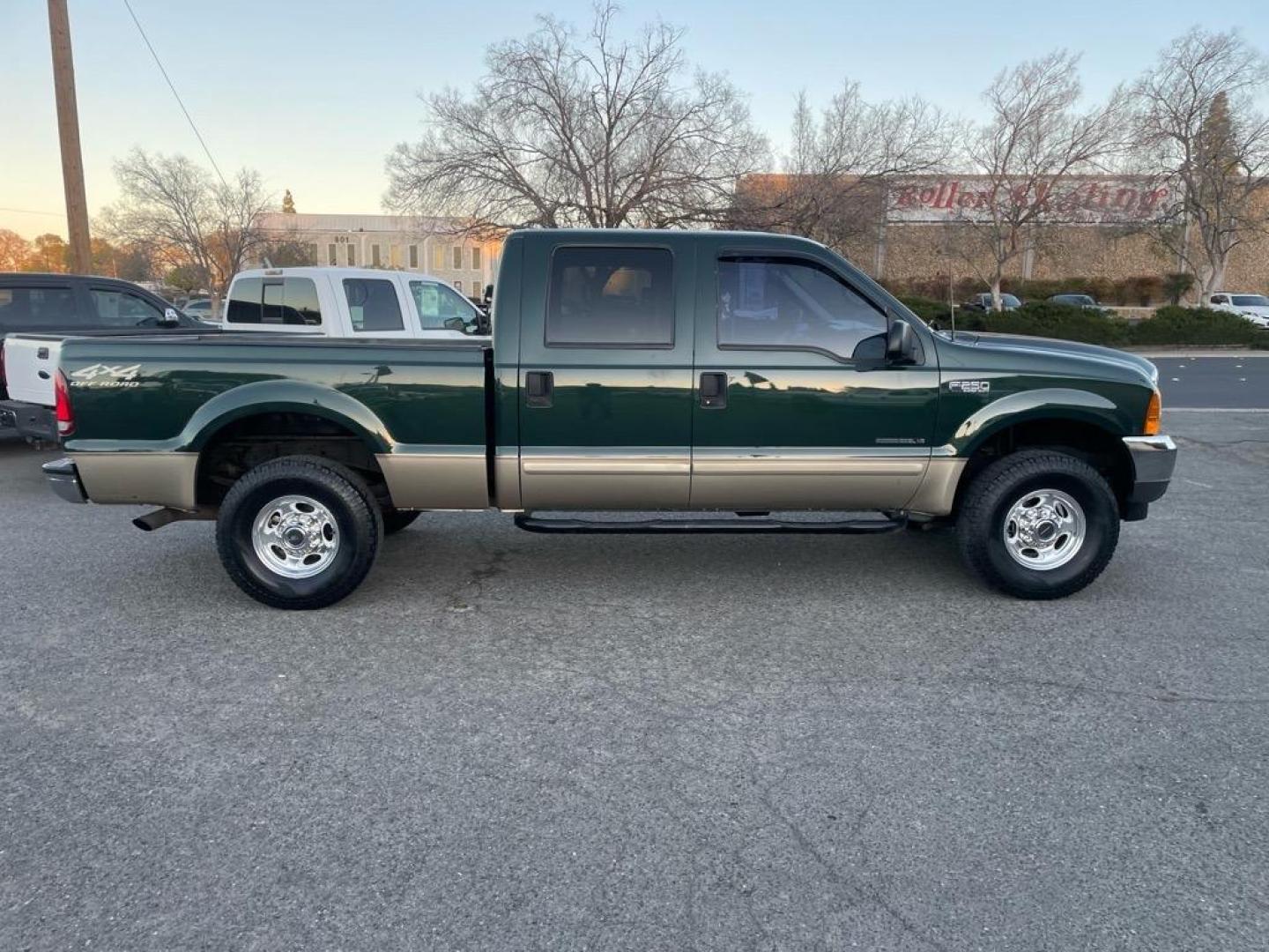 2001 Dark Highland Green Clearcoat Metallic Ford F-250 Super Duty XLT (1FTNW21F21E) with an Power Stroke 7.3L Diesel Turbo V8 250hp 505ft. lbs. Other engine, 4-Speed Automatic transmission, located at 800 Riverside Ave, Roseville, CA, 95678, 916-773-4549 & Toll Free: 866-719-4393, 38.732265, -121.291039 - 7.3 DIESEL CREW CAB 4X4 OFF ROAD XLT LOW MILES CLEAN CARFAX - Photo#5