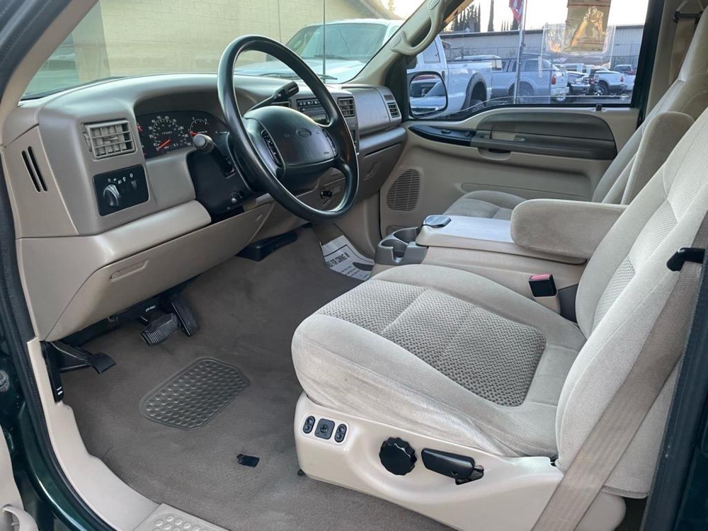 2001 Dark Highland Green Clearcoat Metallic Ford F-250 Super Duty XLT (1FTNW21F21E) with an Power Stroke 7.3L Diesel Turbo V8 250hp 505ft. lbs. Other engine, 4-Speed Automatic transmission, located at 800 Riverside Ave, Roseville, CA, 95678, 916-773-4549 & Toll Free: 866-719-4393, 38.732265, -121.291039 - 7.3 DIESEL CREW CAB 4X4 OFF ROAD XLT LOW MILES CLEAN CARFAX - Photo#12