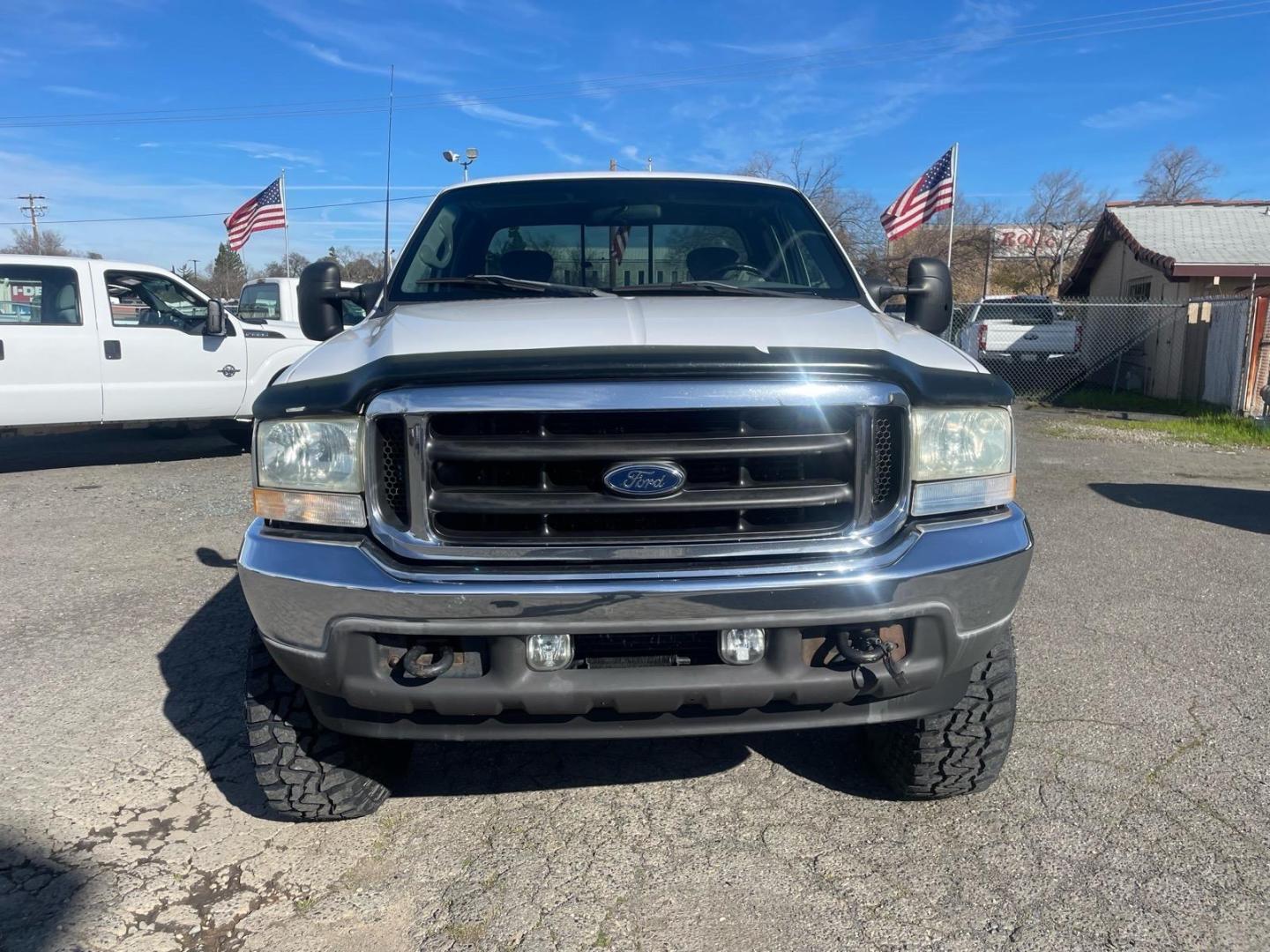 2002 Oxford White Clearcoat Metallic Ford F-350 Super Duty XLT (1FTSX31F22E) with an Power Stroke 7.3L Diesel Turbo V8 250hp 525ft. lbs. Other engine, 4-Speed Automatic transmission, located at 800 Riverside Ave, Roseville, CA, 95678, 916-773-4549 & Toll Free: 866-719-4393, 38.732265, -121.291039 - 7.3 DIESEL SUPER CAB 4X4 LIFTED CLEAN CARFAX- Photo#7