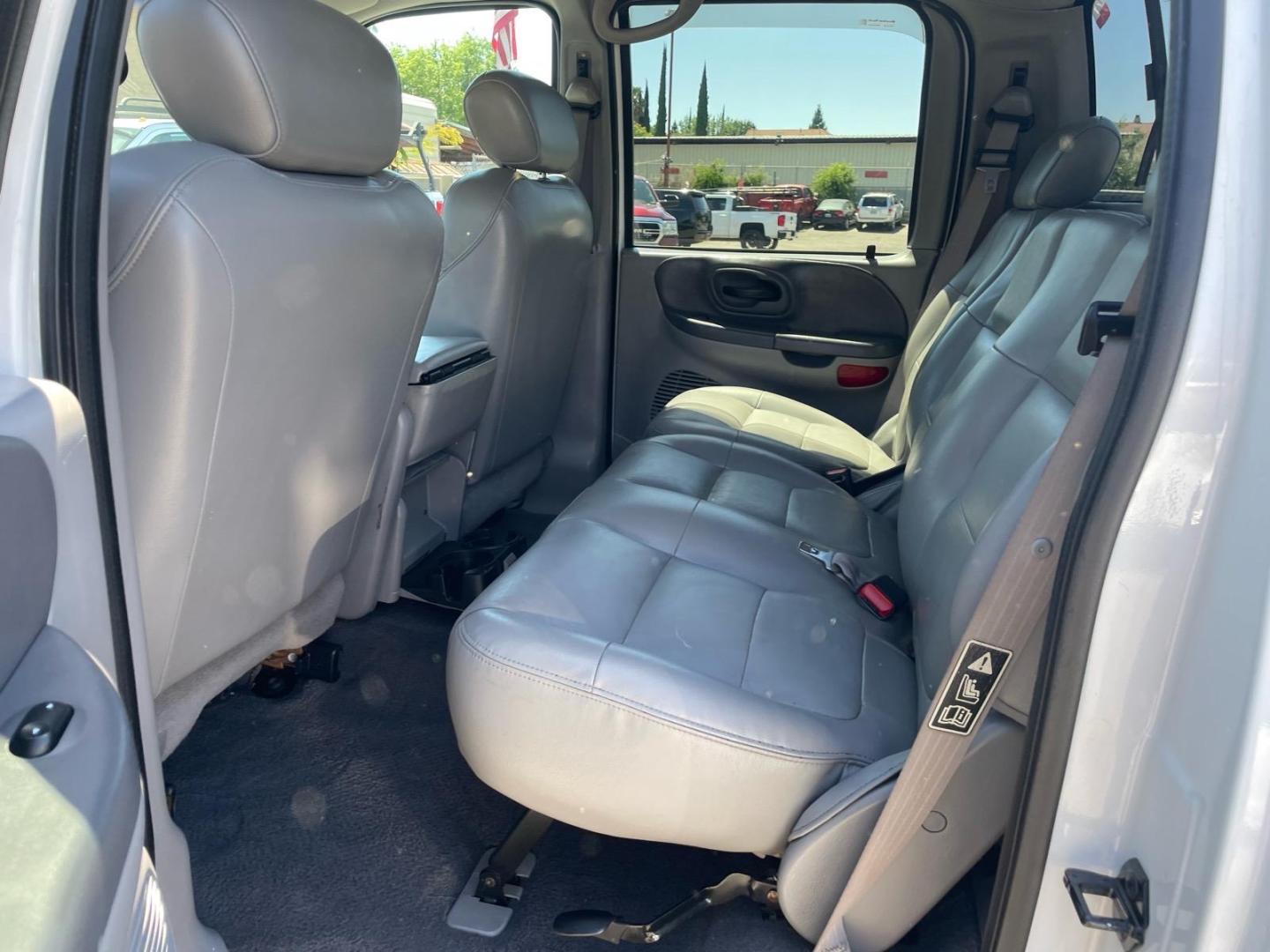 2003 Oxford White Ford F-150 Lariat (1FTRW08L83K) with an Triton 5.4L V8 260hp 350ft. lbs. Other engine, 4-Speed Automatic transmission, located at 800 Riverside Ave, Roseville, CA, 95678, 916-773-4549 & Toll Free: 866-719-4393, 38.732265, -121.291039 - 4X4 SUPERCREW LARIAT LOW MILES MOON ROOF- Photo#11