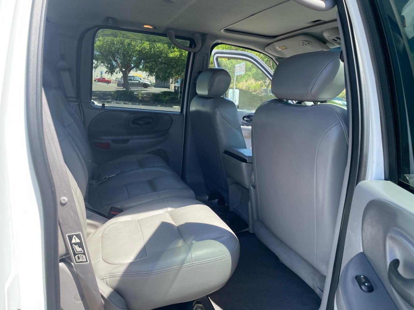 2003 Oxford White Ford F-150 Lariat (1FTRW08L83K) with an Triton 5.4L V8 260hp 350ft. lbs. Other engine, 4-Speed Automatic transmission, located at 800 Riverside Ave, Roseville, CA, 95678, 916-773-4549 & Toll Free: 866-719-4393, 38.732265, -121.291039 - 4X4 SUPERCREW LARIAT LOW MILES MOON ROOF- Photo#12