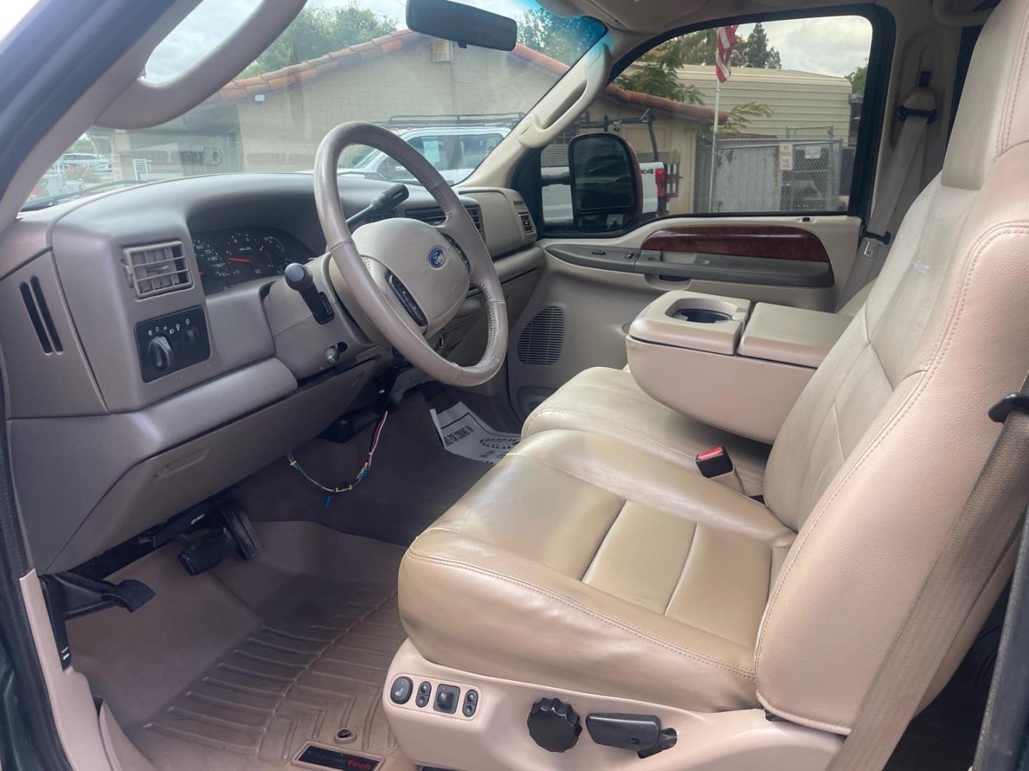 2003 Dark Highland Green Metallic/Arizona Beige Metalli Ford F-250 Super Duty Lariat (1FTNW21P03E) with an Power Stroke 6.0L Diesel Turbo V8 325hp 560ft. lbs. Other engine, 5-Speed Automatic transmission, located at 800 Riverside Ave, Roseville, CA, 95678, 916-773-4549 & Toll Free: 866-719-4393, 38.732265, -121.291039 - DIESEL CREW CAB 4X4 FX4 LARIAT LIFTED CLEAN CARFAX- Photo#8