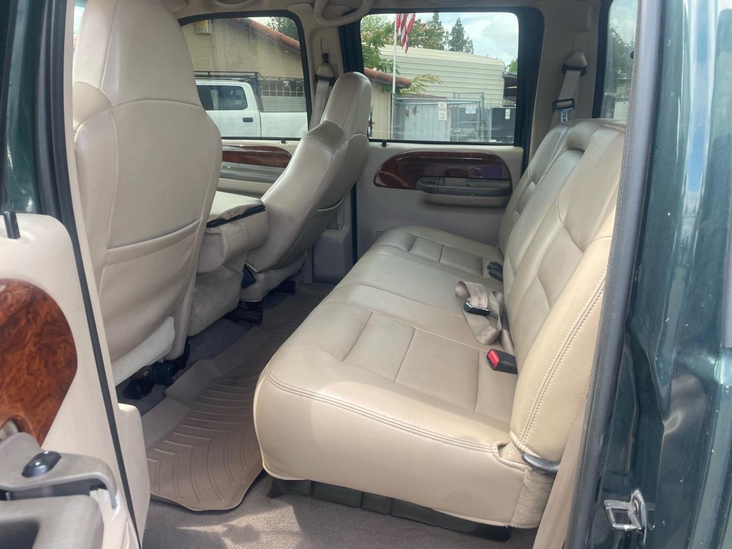 2003 Dark Highland Green Metallic/Arizona Beige Metalli Ford F-250 Super Duty Lariat (1FTNW21P03E) with an Power Stroke 6.0L Diesel Turbo V8 325hp 560ft. lbs. Other engine, 5-Speed Automatic transmission, located at 800 Riverside Ave, Roseville, CA, 95678, 916-773-4549 & Toll Free: 866-719-4393, 38.732265, -121.291039 - DIESEL CREW CAB 4X4 FX4 LARIAT LIFTED CLEAN CARFAX- Photo#11