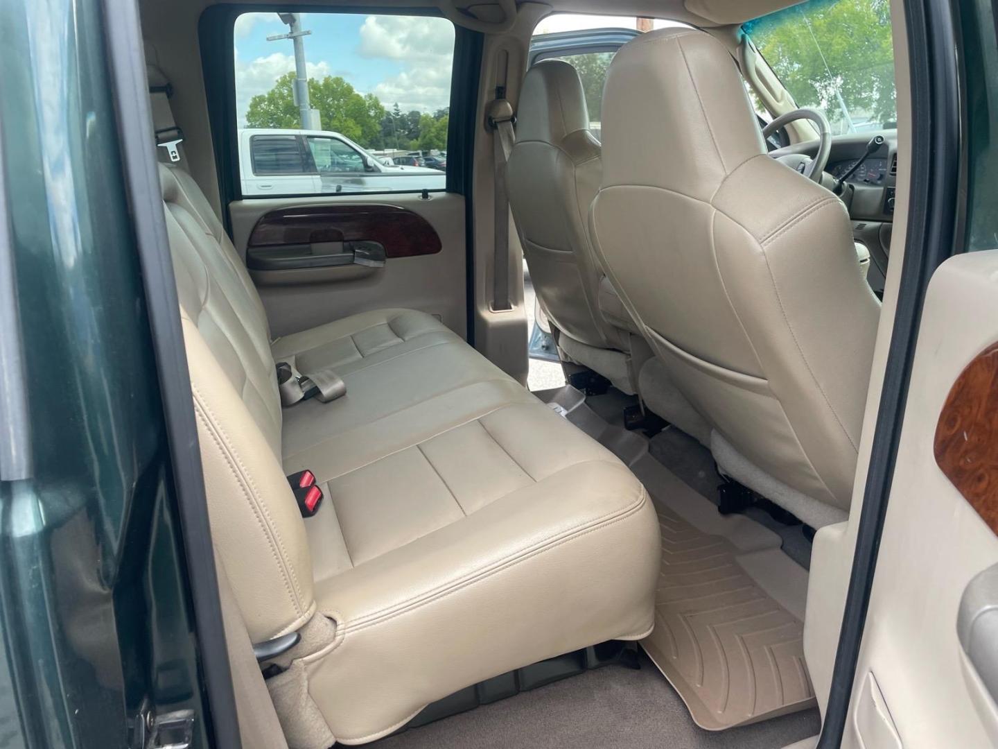 2003 Dark Highland Green Metallic/Arizona Beige Metalli Ford F-250 Super Duty Lariat (1FTNW21P03E) with an Power Stroke 6.0L Diesel Turbo V8 325hp 560ft. lbs. Other engine, 5-Speed Automatic transmission, located at 800 Riverside Ave, Roseville, CA, 95678, 916-773-4549 & Toll Free: 866-719-4393, 38.732265, -121.291039 - DIESEL CREW CAB 4X4 FX4 LARIAT LIFTED CLEAN CARFAX- Photo#13