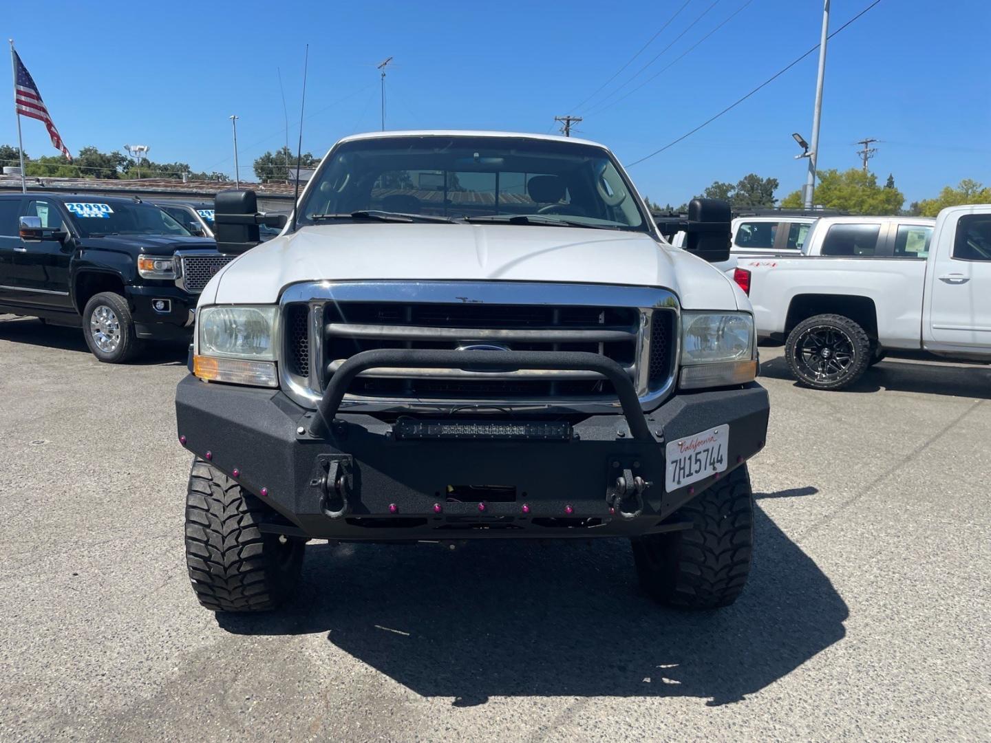 2003 Oxford White Ford F-250 Super Duty XLT (1FTNX21P03E) with an Power Stroke 6.0L Diesel Turbo V8 325hp 560ft. lbs. Other engine, 5-Speed Automatic transmission, located at 800 Riverside Ave, Roseville, CA, 95678, 916-773-4549 & Toll Free: 866-719-4393, 38.732265, -121.291039 - DIESEL SUPER CAB 4X4 LIFTED- Photo#6