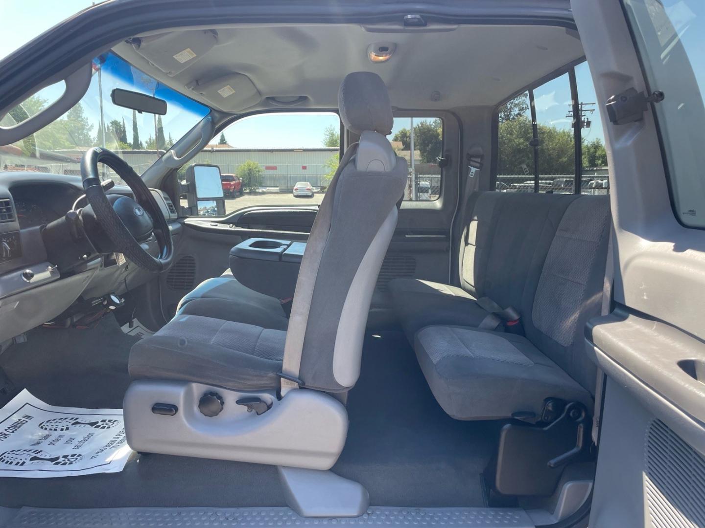 2003 Oxford White Ford F-250 Super Duty XLT (1FTNX21P03E) with an Power Stroke 6.0L Diesel Turbo V8 325hp 560ft. lbs. Other engine, 5-Speed Automatic transmission, located at 800 Riverside Ave, Roseville, CA, 95678, 916-773-4549 & Toll Free: 866-719-4393, 38.732265, -121.291039 - DIESEL SUPER CAB 4X4 LIFTED- Photo#10