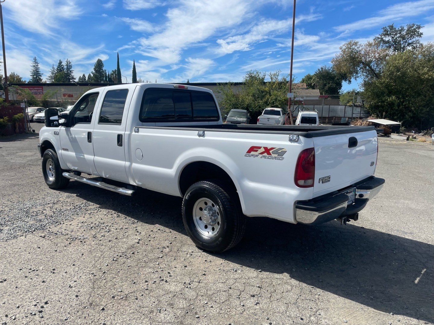 2003 Oxford White Ford F-250 Super Duty XLT (1FTNW21P63E) with an Power Stroke 6.0L Diesel Turbo V8 325hp 560ft. lbs. Other engine, 5-Speed Automatic transmission, located at 800 Riverside Ave, Roseville, CA, 95678, 916-773-4549 & Toll Free: 866-719-4393, 38.732265, -121.291039 - DIESEL CREW CAB 4X4 FX4 XLT SERVICE RECORDS ON CLEAN CARFAX- Photo#2