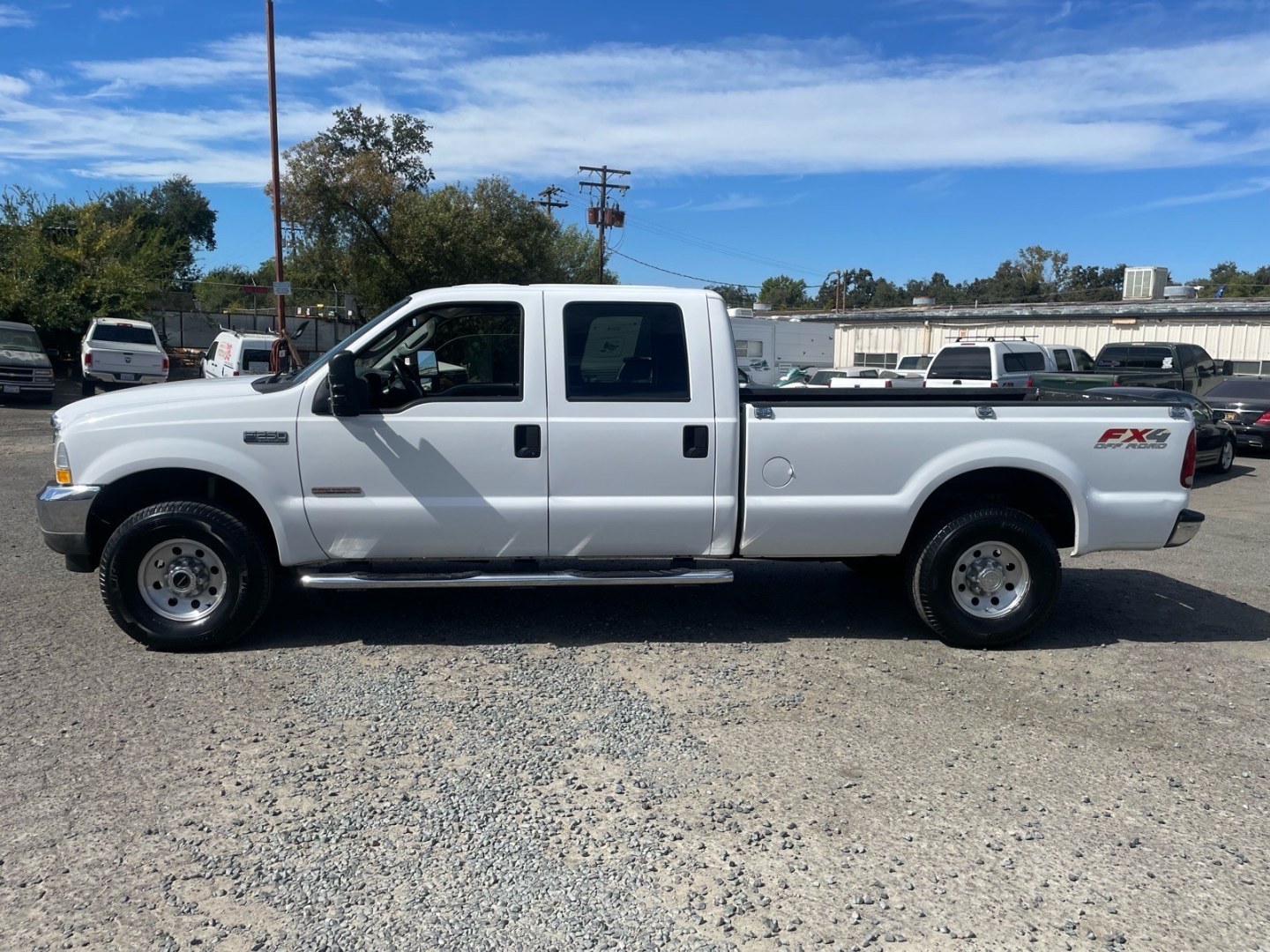 2003 Oxford White Ford F-250 Super Duty XLT (1FTNW21P63E) with an Power Stroke 6.0L Diesel Turbo V8 325hp 560ft. lbs. Other engine, 5-Speed Automatic transmission, located at 800 Riverside Ave, Roseville, CA, 95678, 916-773-4549 & Toll Free: 866-719-4393, 38.732265, -121.291039 - DIESEL CREW CAB 4X4 FX4 XLT SERVICE RECORDS ON CLEAN CARFAX- Photo#4