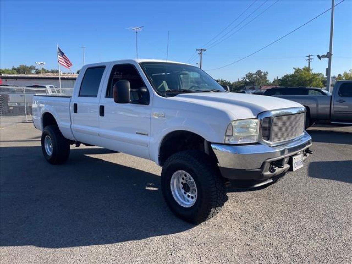 2003 Oxford White Ford F-250 Super Duty XLT (1FTNW21P53E) with an Power Stroke 6.0L Diesel Turbo V8 325hp 560ft. lbs. Other engine, 5-Speed Automatic transmission, located at 800 Riverside Ave, Roseville, CA, 95678, 916-773-4549 & Toll Free: 866-719-4393, 38.732265, -121.291039 - DIESEL CREW CAB 4X4 XLT DVD LIFTED NEW EGR AND OIL COOLER NEW HIGH PRESSURE OIL PUMP SERVICE RECORDS ON CLEAN CARFAX - Photo#1