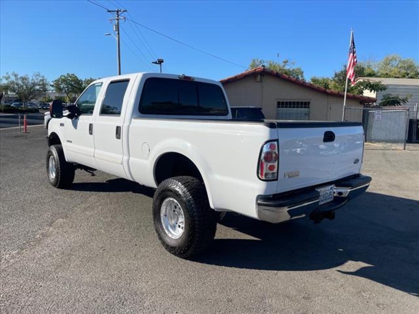 2003 Oxford White Ford F-250 Super Duty XLT (1FTNW21P53E) with an Power Stroke 6.0L Diesel Turbo V8 325hp 560ft. lbs. Other engine, 5-Speed Automatic transmission, located at 800 Riverside Ave, Roseville, CA, 95678, 916-773-4549 & Toll Free: 866-719-4393, 38.732265, -121.291039 - DIESEL CREW CAB 4X4 XLT DVD LIFTED NEW EGR AND OIL COOLER NEW HIGH PRESSURE OIL PUMP SERVICE RECORDS ON CLEAN CARFAX - Photo#3