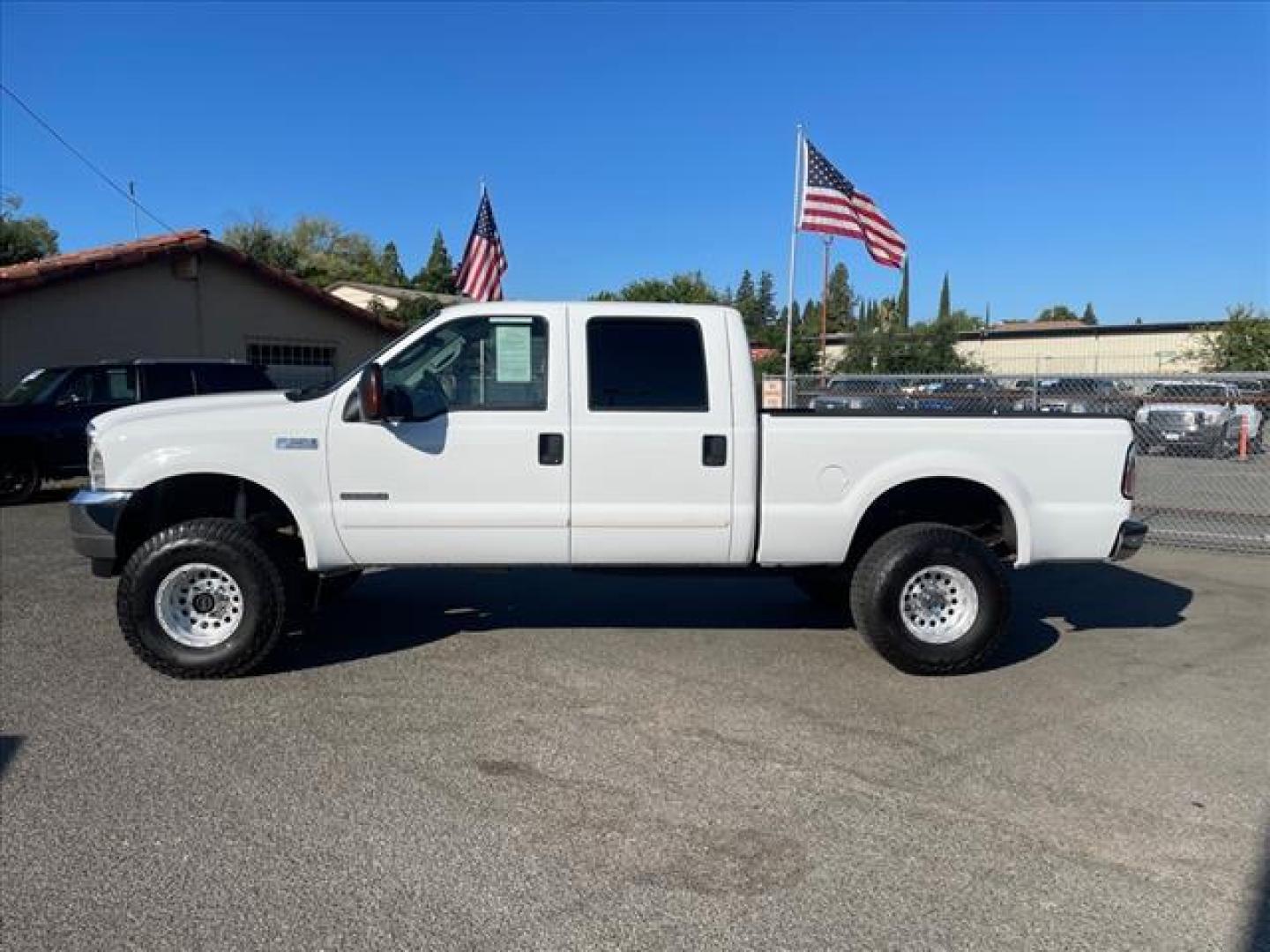 2003 Oxford White Ford F-250 Super Duty XLT (1FTNW21P53E) with an Power Stroke 6.0L Diesel Turbo V8 325hp 560ft. lbs. Other engine, 5-Speed Automatic transmission, located at 800 Riverside Ave, Roseville, CA, 95678, 916-773-4549 & Toll Free: 866-719-4393, 38.732265, -121.291039 - DIESEL CREW CAB 4X4 XLT DVD LIFTED NEW EGR AND OIL COOLER NEW HIGH PRESSURE OIL PUMP SERVICE RECORDS ON CLEAN CARFAX - Photo#5