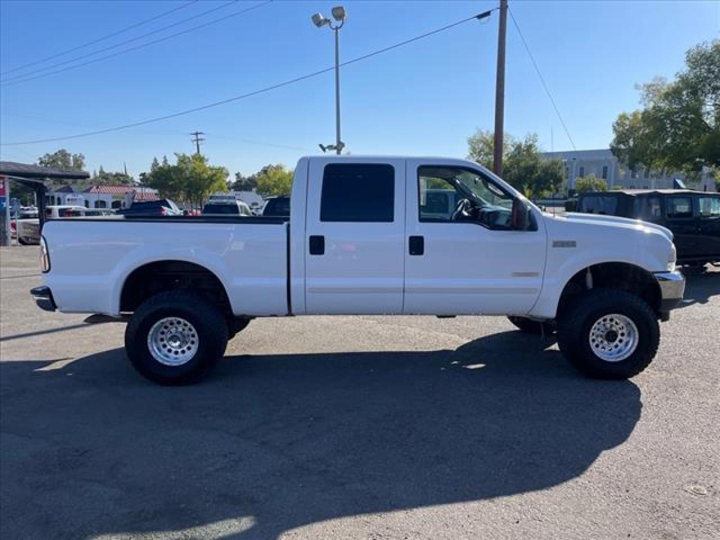 2003 Oxford White Ford F-250 Super Duty XLT (1FTNW21P53E) with an Power Stroke 6.0L Diesel Turbo V8 325hp 560ft. lbs. Other engine, 5-Speed Automatic transmission, located at 800 Riverside Ave, Roseville, CA, 95678, 916-773-4549 & Toll Free: 866-719-4393, 38.732265, -121.291039 - DIESEL CREW CAB 4X4 XLT DVD LIFTED NEW EGR AND OIL COOLER NEW HIGH PRESSURE OIL PUMP SERVICE RECORDS ON CLEAN CARFAX - Photo#6
