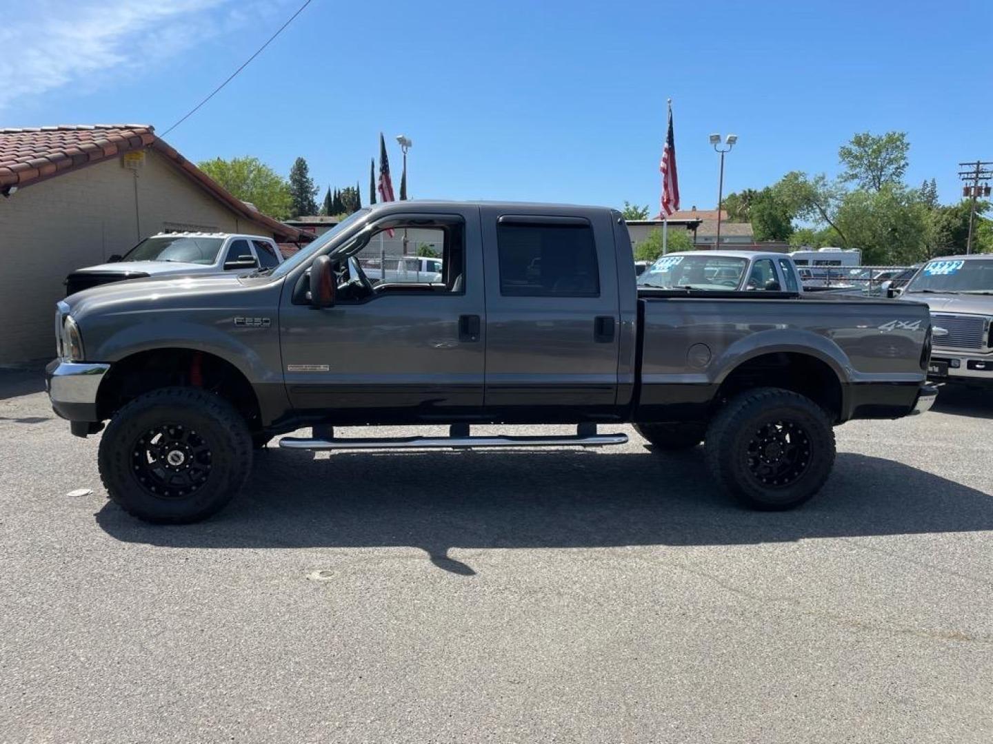 2003 Dark Shadow Grey Metallic/Black Ford F-250 Super Duty Lariat (1FTNW21P53E) with an Power Stroke 6.0L Diesel Turbo V8 325hp 560ft. lbs. Other engine, 5-Speed Automatic transmission, located at 800 Riverside Ave, Roseville, CA, 95678, 916-773-4549 & Toll Free: 866-719-4393, 38.732265, -121.291039 - DIESEL CREW CAB 4X4 LARIAT LIFTED CLEAN CARFAX - Photo#2