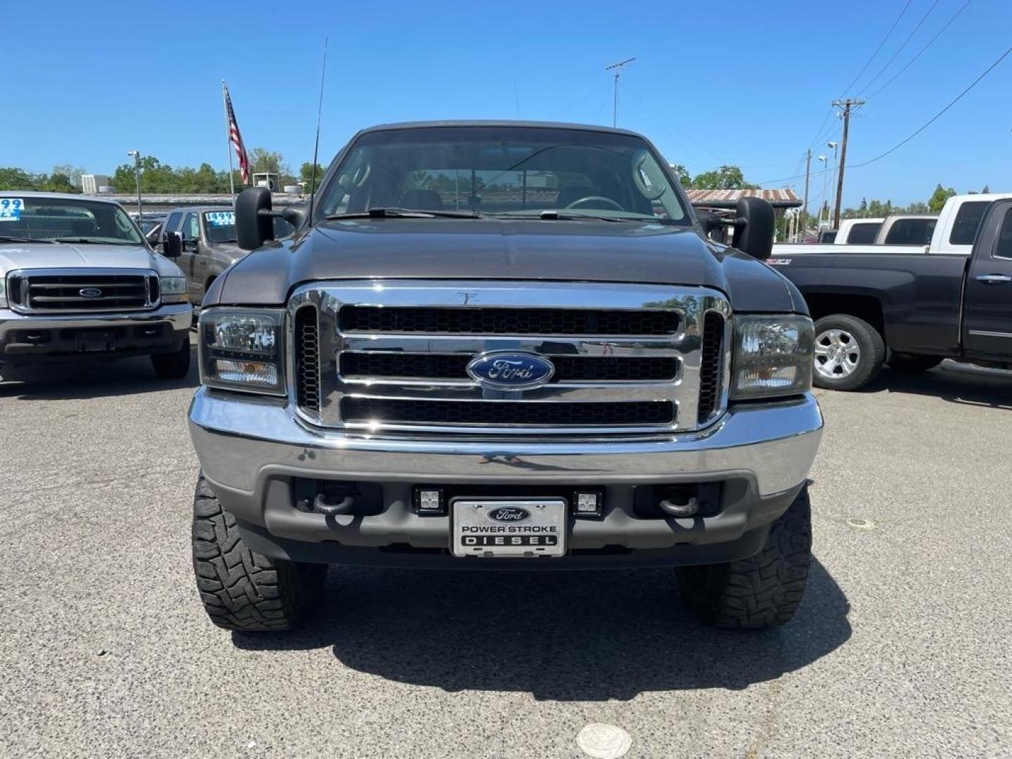 2003 Dark Shadow Grey Metallic/Black Ford F-250 Super Duty Lariat (1FTNW21P53E) with an Power Stroke 6.0L Diesel Turbo V8 325hp 560ft. lbs. Other engine, 5-Speed Automatic transmission, located at 800 Riverside Ave, Roseville, CA, 95678, 916-773-4549 & Toll Free: 866-719-4393, 38.732265, -121.291039 - DIESEL CREW CAB 4X4 LARIAT LIFTED CLEAN CARFAX - Photo#5