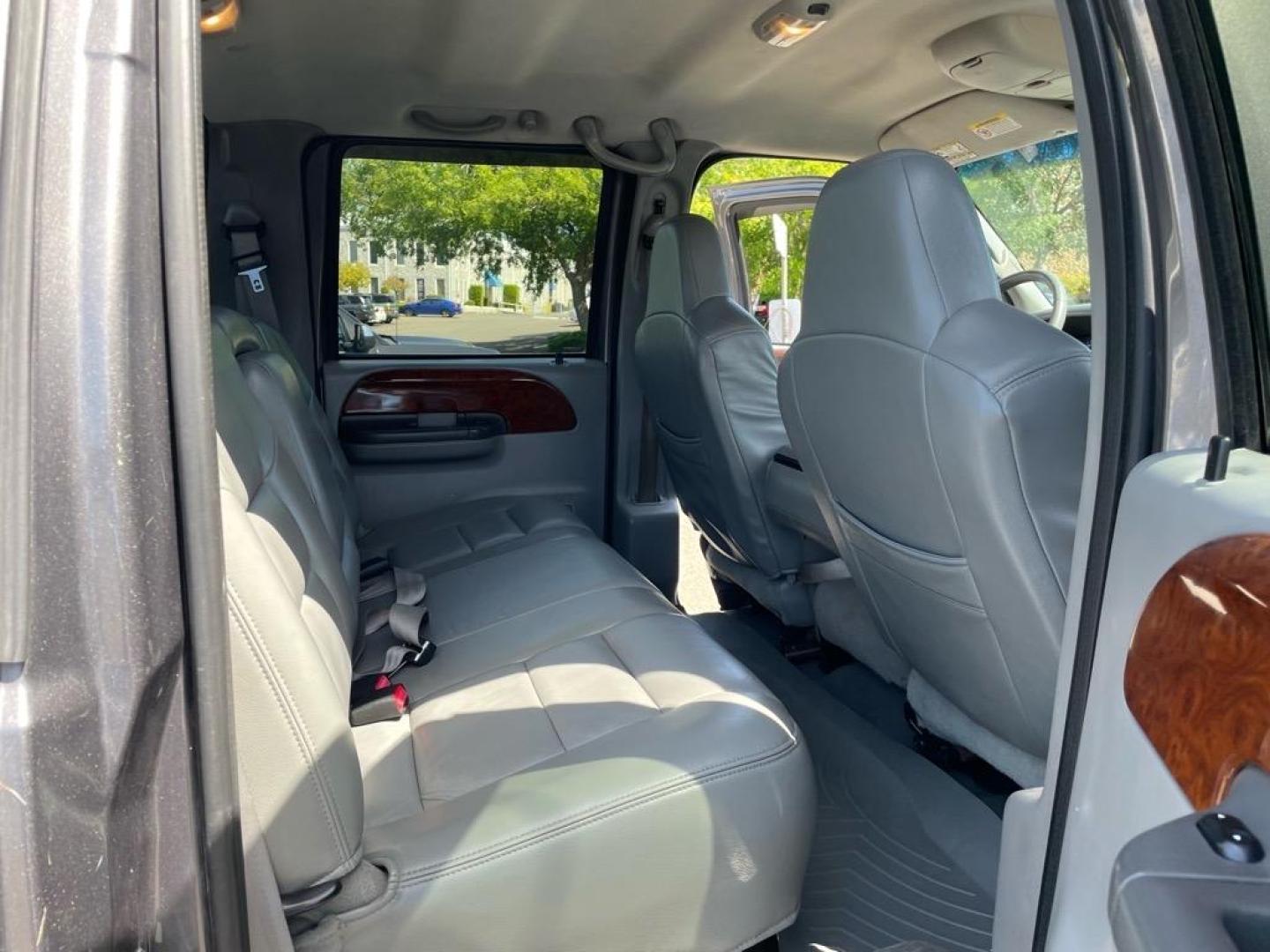 2003 Dark Shadow Grey Metallic/Black Ford F-250 Super Duty Lariat (1FTNW21P53E) with an Power Stroke 6.0L Diesel Turbo V8 325hp 560ft. lbs. Other engine, 5-Speed Automatic transmission, located at 800 Riverside Ave, Roseville, CA, 95678, 916-773-4549 & Toll Free: 866-719-4393, 38.732265, -121.291039 - DIESEL CREW CAB 4X4 LARIAT LIFTED CLEAN CARFAX - Photo#10