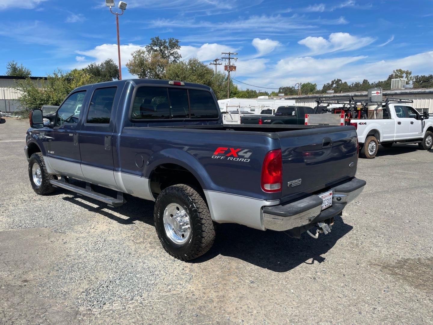 2004 Medium Wedgewood Blue Clearcoat Ford F-250 Super Duty XLT (1FTNW21P44E) with an Power Stroke 6.0L Diesel Turbo V8 325hp 560ft. lbs. Other engine, 5-Speed Automatic transmission, located at 800 Riverside Ave, Roseville, CA, 95678, 916-773-4549 & Toll Free: 866-719-4393, 38.732265, -121.291039 - DIESEL CREW CAB 4X4 FX4 XLT CLEAN CARFAX- Photo#2