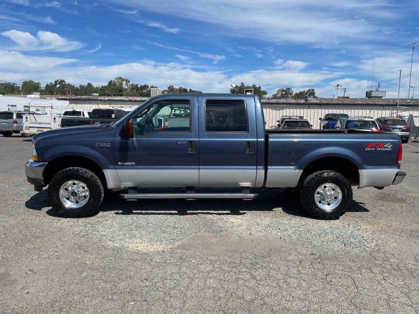 2004 Medium Wedgewood Blue Clearcoat Ford F-250 Super Duty XLT (1FTNW21P44E) with an Power Stroke 6.0L Diesel Turbo V8 325hp 560ft. lbs. Other engine, 5-Speed Automatic transmission, located at 800 Riverside Ave, Roseville, CA, 95678, 916-773-4549 & Toll Free: 866-719-4393, 38.732265, -121.291039 - DIESEL CREW CAB 4X4 FX4 XLT CLEAN CARFAX- Photo#4
