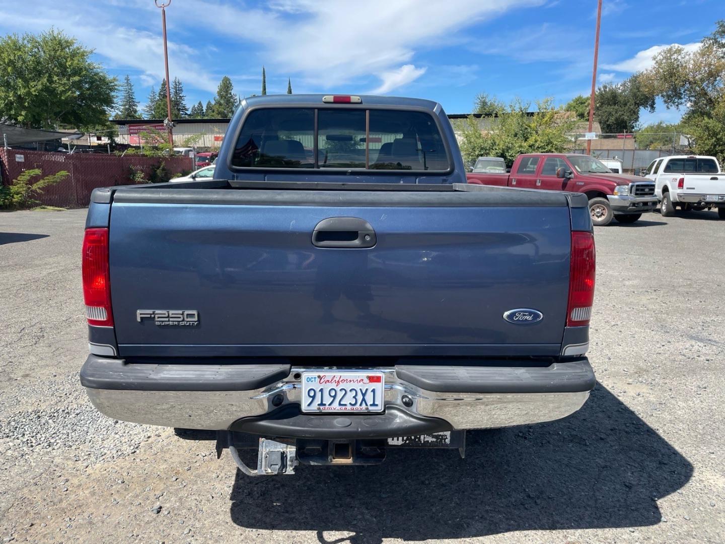 2004 Medium Wedgewood Blue Clearcoat Ford F-250 Super Duty XLT (1FTNW21P44E) with an Power Stroke 6.0L Diesel Turbo V8 325hp 560ft. lbs. Other engine, 5-Speed Automatic transmission, located at 800 Riverside Ave, Roseville, CA, 95678, 916-773-4549 & Toll Free: 866-719-4393, 38.732265, -121.291039 - DIESEL CREW CAB 4X4 FX4 XLT CLEAN CARFAX- Photo#7