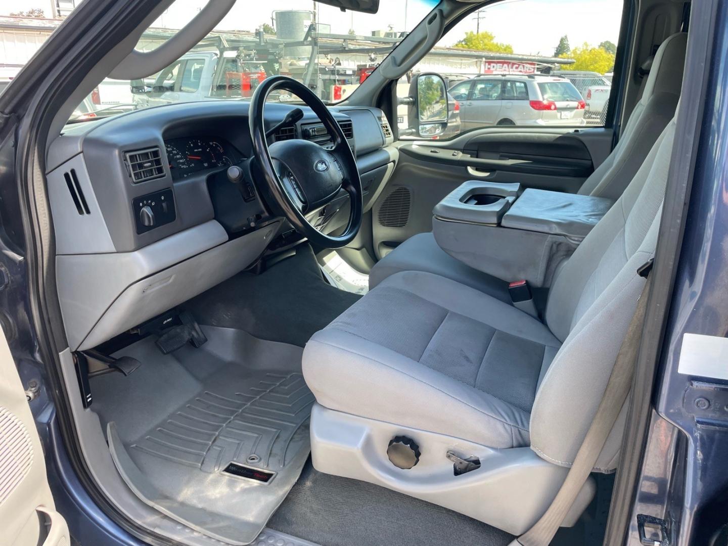 2004 Medium Wedgewood Blue Clearcoat Ford F-250 Super Duty XLT (1FTNW21P44E) with an Power Stroke 6.0L Diesel Turbo V8 325hp 560ft. lbs. Other engine, 5-Speed Automatic transmission, located at 800 Riverside Ave, Roseville, CA, 95678, 916-773-4549 & Toll Free: 866-719-4393, 38.732265, -121.291039 - DIESEL CREW CAB 4X4 FX4 XLT CLEAN CARFAX- Photo#9