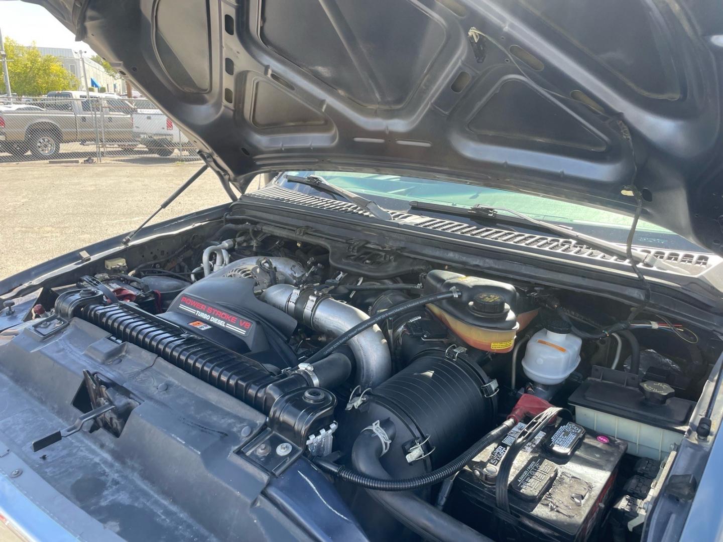 2004 Medium Wedgewood Blue Clearcoat Ford F-250 Super Duty XLT (1FTNW21P44E) with an Power Stroke 6.0L Diesel Turbo V8 325hp 560ft. lbs. Other engine, 5-Speed Automatic transmission, located at 800 Riverside Ave, Roseville, CA, 95678, 916-773-4549 & Toll Free: 866-719-4393, 38.732265, -121.291039 - DIESEL CREW CAB 4X4 FX4 XLT CLEAN CARFAX- Photo#13