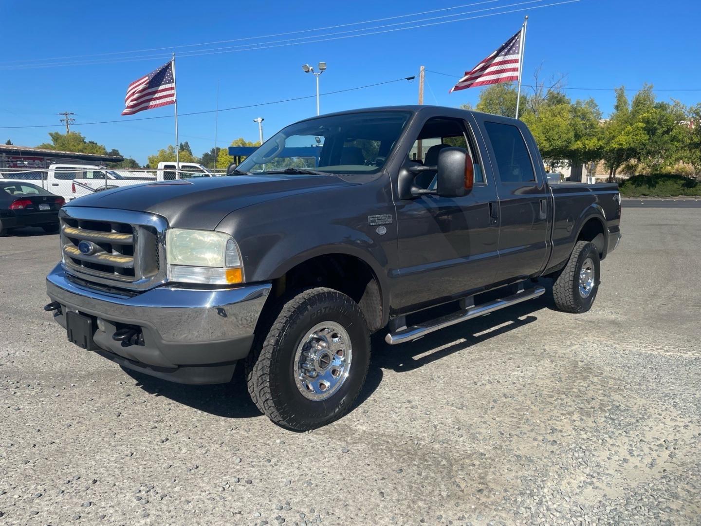 2004 Dark Shadow Grey Clearcoat Metallic Ford F-250 Super Duty XLT (1FTNW21L84E) with an Triton 5.4L V8 260hp 350ft. lbs. Other engine, 4-Speed Automatic transmission, located at 800 Riverside Ave, Roseville, CA, 95678, 916-773-4549 & Toll Free: 866-719-4393, 38.732265, -121.291039- Photo#0