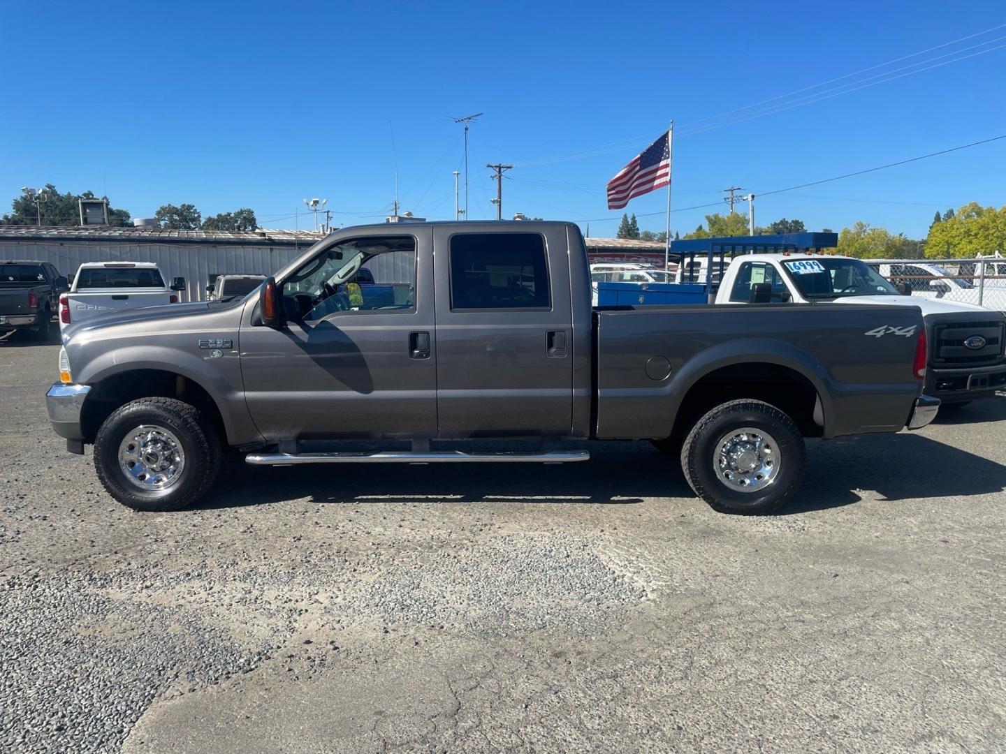 2004 Dark Shadow Grey Clearcoat Metallic Ford F-250 Super Duty XLT (1FTNW21L84E) with an Triton 5.4L V8 260hp 350ft. lbs. Other engine, 4-Speed Automatic transmission, located at 800 Riverside Ave, Roseville, CA, 95678, 916-773-4549 & Toll Free: 866-719-4393, 38.732265, -121.291039- Photo#1
