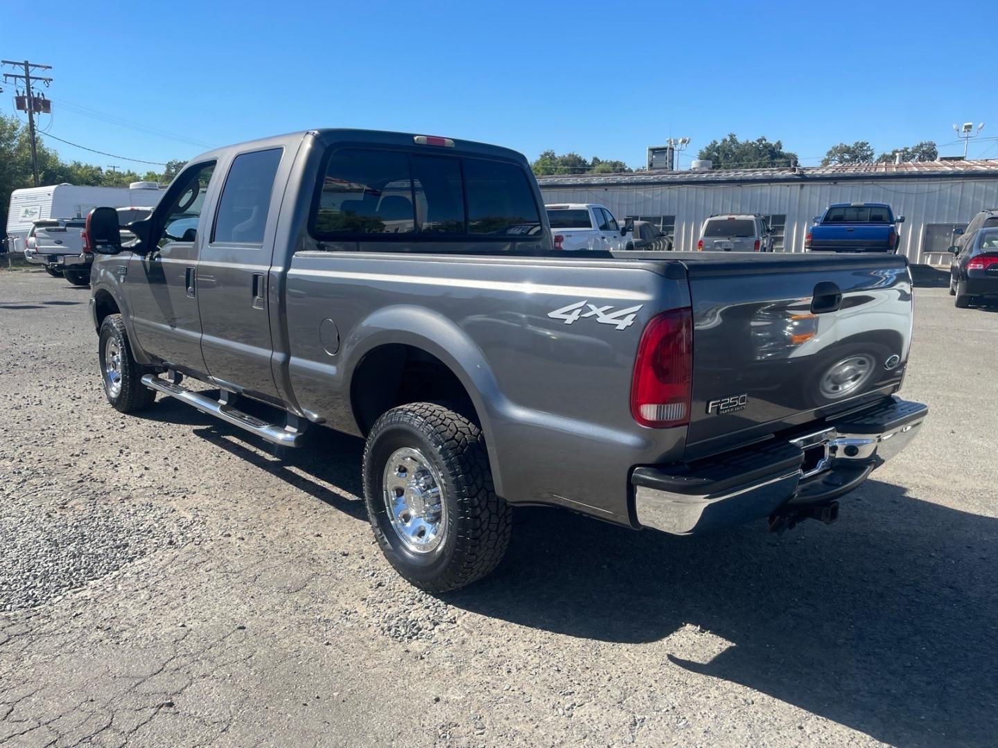 2004 Dark Shadow Grey Clearcoat Metallic Ford F-250 Super Duty XLT (1FTNW21L84E) with an Triton 5.4L V8 260hp 350ft. lbs. Other engine, 4-Speed Automatic transmission, located at 800 Riverside Ave, Roseville, CA, 95678, 916-773-4549 & Toll Free: 866-719-4393, 38.732265, -121.291039- Photo#2