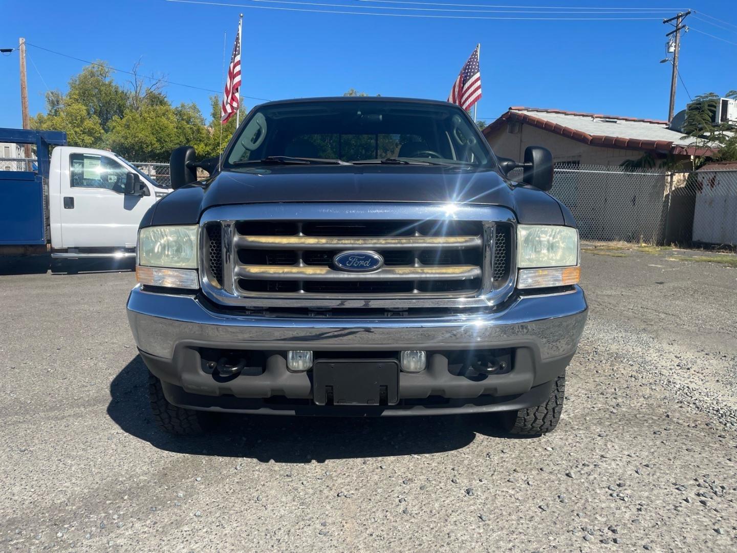 2004 Dark Shadow Grey Clearcoat Metallic Ford F-250 Super Duty XLT (1FTNW21L84E) with an Triton 5.4L V8 260hp 350ft. lbs. Other engine, 4-Speed Automatic transmission, located at 800 Riverside Ave, Roseville, CA, 95678, 916-773-4549 & Toll Free: 866-719-4393, 38.732265, -121.291039- Photo#7