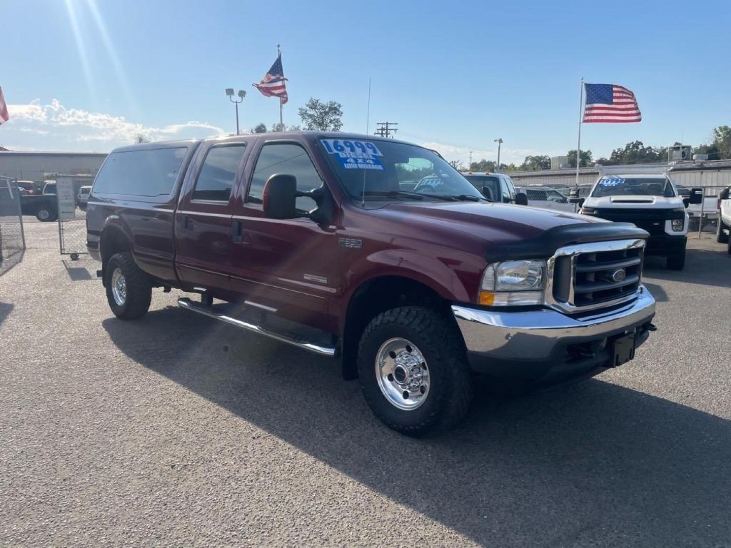 2004 Dark Toreador Red Clearcoat Ford F-350 Super Duty XLT (1FTSW31P44E) with an Power Stroke 6.0L Diesel Turbo V8 325hp 560ft. lbs. Other engine, 5-Speed Automatic transmission, located at 800 Riverside Ave, Roseville, CA, 95678, 916-773-4549 & Toll Free: 866-719-4393, 38.732265, -121.291039 - DIESEL CREW CAB 4X4 XLT LOW MILES ONE OWNER - Photo#1