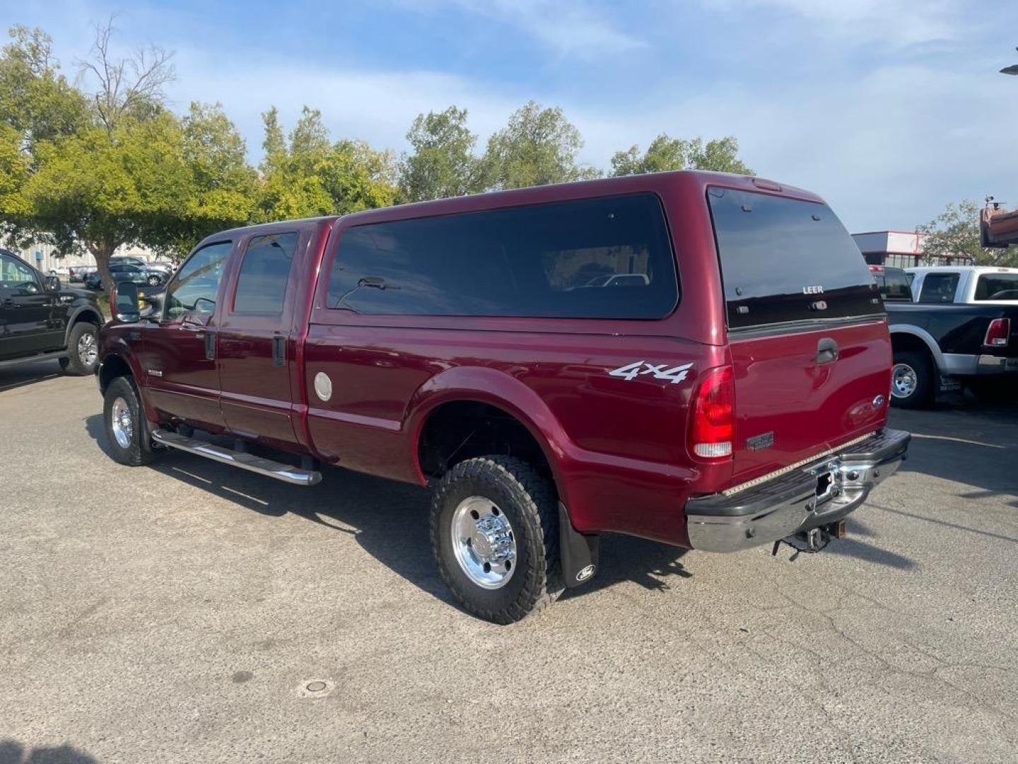 2004 Dark Toreador Red Clearcoat Ford F-350 Super Duty XLT (1FTSW31P44E) with an Power Stroke 6.0L Diesel Turbo V8 325hp 560ft. lbs. Other engine, 5-Speed Automatic transmission, located at 800 Riverside Ave, Roseville, CA, 95678, 916-773-4549 & Toll Free: 866-719-4393, 38.732265, -121.291039 - DIESEL CREW CAB 4X4 XLT LOW MILES ONE OWNER - Photo#2