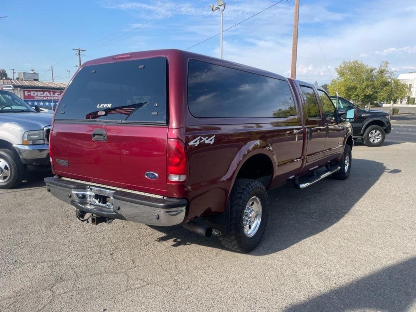 2004 Dark Toreador Red Clearcoat Ford F-350 Super Duty XLT (1FTSW31P44E) with an Power Stroke 6.0L Diesel Turbo V8 325hp 560ft. lbs. Other engine, 5-Speed Automatic transmission, located at 800 Riverside Ave, Roseville, CA, 95678, 916-773-4549 & Toll Free: 866-719-4393, 38.732265, -121.291039 - DIESEL CREW CAB 4X4 XLT LOW MILES ONE OWNER - Photo#3