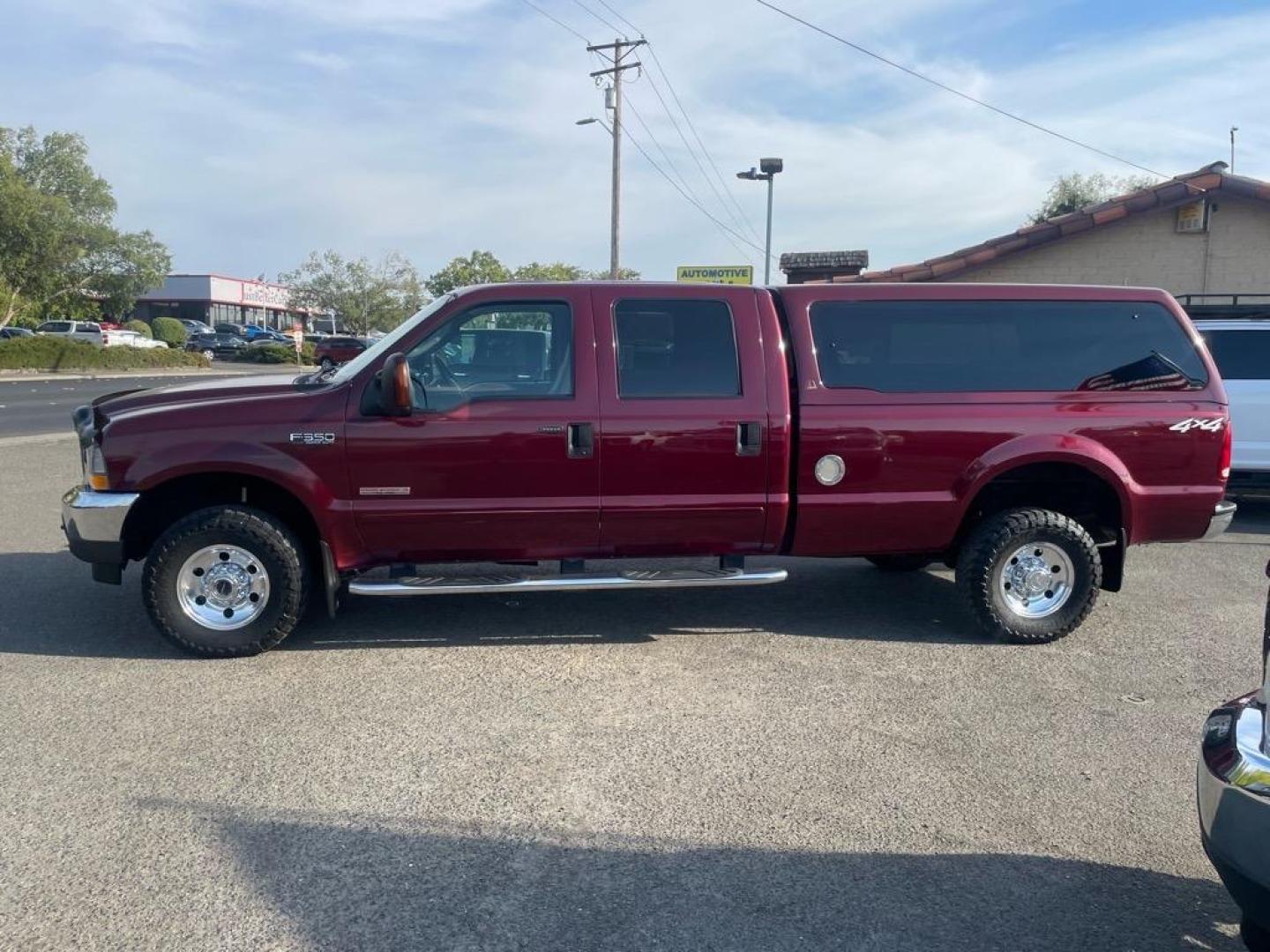 2004 Dark Toreador Red Clearcoat Ford F-350 Super Duty XLT (1FTSW31P44E) with an Power Stroke 6.0L Diesel Turbo V8 325hp 560ft. lbs. Other engine, 5-Speed Automatic transmission, located at 800 Riverside Ave, Roseville, CA, 95678, 916-773-4549 & Toll Free: 866-719-4393, 38.732265, -121.291039 - DIESEL CREW CAB 4X4 XLT LOW MILES ONE OWNER - Photo#4