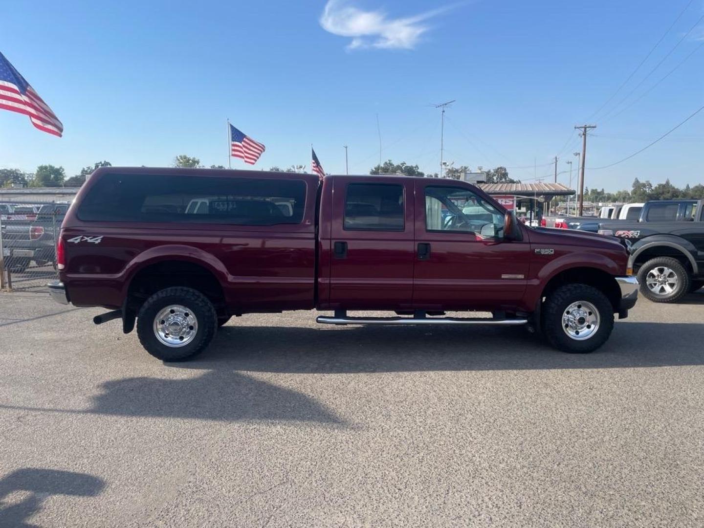 2004 Dark Toreador Red Clearcoat Ford F-350 Super Duty XLT (1FTSW31P44E) with an Power Stroke 6.0L Diesel Turbo V8 325hp 560ft. lbs. Other engine, 5-Speed Automatic transmission, located at 800 Riverside Ave, Roseville, CA, 95678, 916-773-4549 & Toll Free: 866-719-4393, 38.732265, -121.291039 - DIESEL CREW CAB 4X4 XLT LOW MILES ONE OWNER - Photo#6