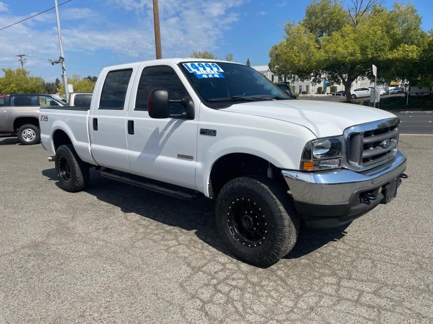 2004 White Ford F-350 Super Duty XLT (1FTSW31P14E) with an Power Stroke 6.0L Diesel Turbo V8 325hp 560ft. lbs. Other engine, 5-Speed Automatic transmission, located at 800 Riverside Ave, Roseville, CA, 95678, 916-773-4549 & Toll Free: 866-719-4393, 38.732265, -121.291039 - DIESEL CREW CAB 4X4 FX4 XLT CLEAN CARFAX - Photo#6