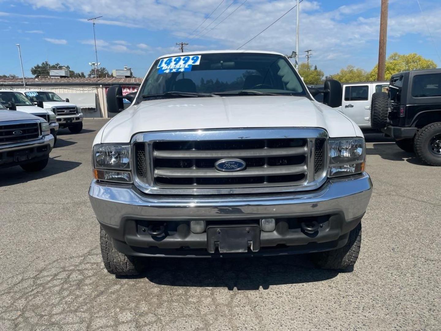 2004 White Ford F-350 Super Duty XLT (1FTSW31P14E) with an Power Stroke 6.0L Diesel Turbo V8 325hp 560ft. lbs. Other engine, 5-Speed Automatic transmission, located at 800 Riverside Ave, Roseville, CA, 95678, 916-773-4549 & Toll Free: 866-719-4393, 38.732265, -121.291039 - DIESEL CREW CAB 4X4 FX4 XLT CLEAN CARFAX - Photo#7