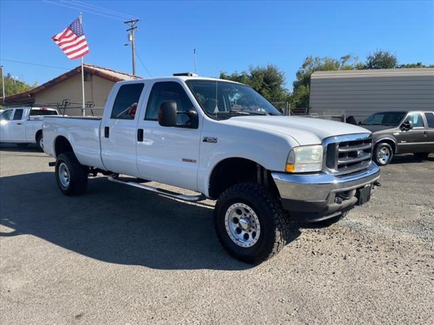 2004 Oxford White Clearcoat Ford F-250 Super Duty XLT (1FTNW21P04E) with an Power Stroke 6.0L Diesel Other engine, 5-Speed Automatic transmission, located at 800 Riverside Ave, Roseville, CA, 95678, 916-773-4549 & Toll Free: 866-719-4393, 38.732265, -121.291039 - DIESEL CREW CAB 4X4 XLT LOW MILES NEW TIRES LIFTED CLEAN CARFAX - Photo#1