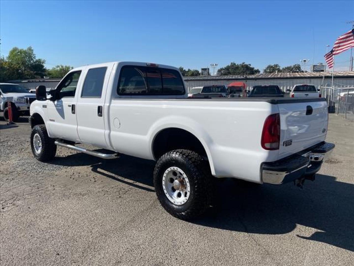 2004 Oxford White Clearcoat Ford F-250 Super Duty XLT (1FTNW21P04E) with an Power Stroke 6.0L Diesel Other engine, 5-Speed Automatic transmission, located at 800 Riverside Ave, Roseville, CA, 95678, 916-773-4549 & Toll Free: 866-719-4393, 38.732265, -121.291039 - DIESEL CREW CAB 4X4 XLT LOW MILES NEW TIRES LIFTED CLEAN CARFAX - Photo#2