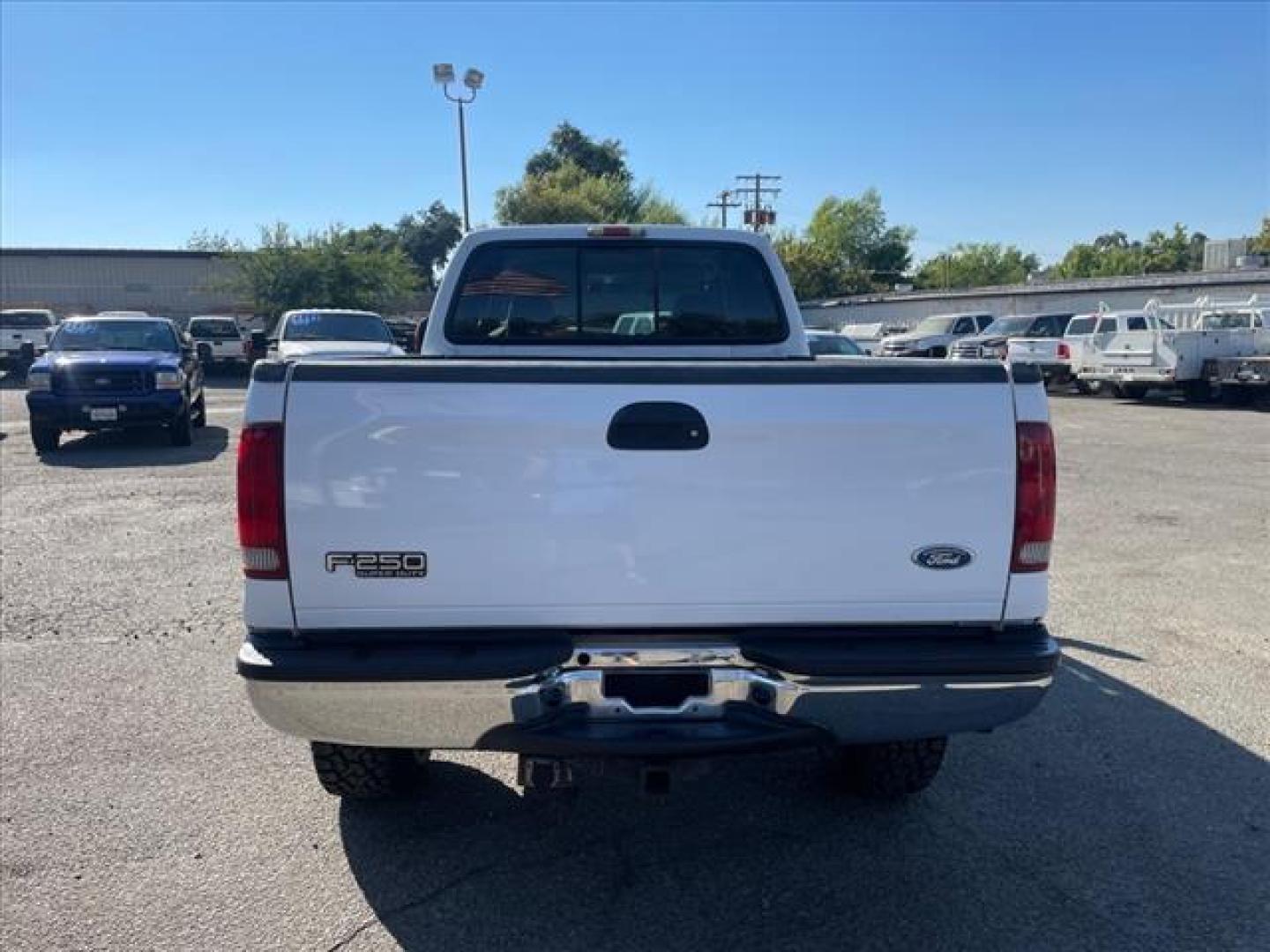 2004 Oxford White Clearcoat Ford F-250 Super Duty XLT (1FTNW21P04E) with an Power Stroke 6.0L Diesel Other engine, 5-Speed Automatic transmission, located at 800 Riverside Ave, Roseville, CA, 95678, 916-773-4549 & Toll Free: 866-719-4393, 38.732265, -121.291039 - DIESEL CREW CAB 4X4 XLT LOW MILES NEW TIRES LIFTED CLEAN CARFAX - Photo#7