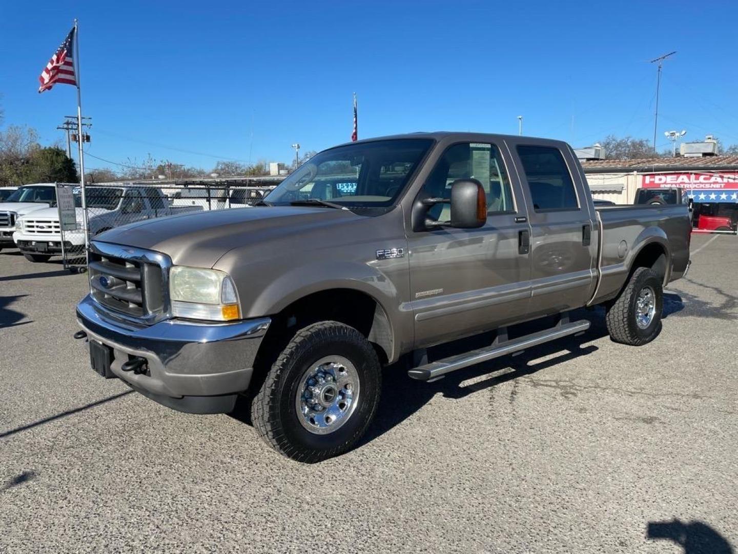 2004 Arizona Beige Clearcoat Metallic Ford F-250 Super Duty XLT (1FTNW21P04E) with an Power Stroke 6.0L Diesel Turbo V8 325hp 560ft. lbs. Other engine, 5-Speed Automatic transmission, located at 800 Riverside Ave, Roseville, CA, 95678, 916-773-4549 & Toll Free: 866-719-4393, 38.732265, -121.291039 - DIESEL CREW CAB 4X4 XLT LOW MILES SERVICE RECORDS - Photo#0