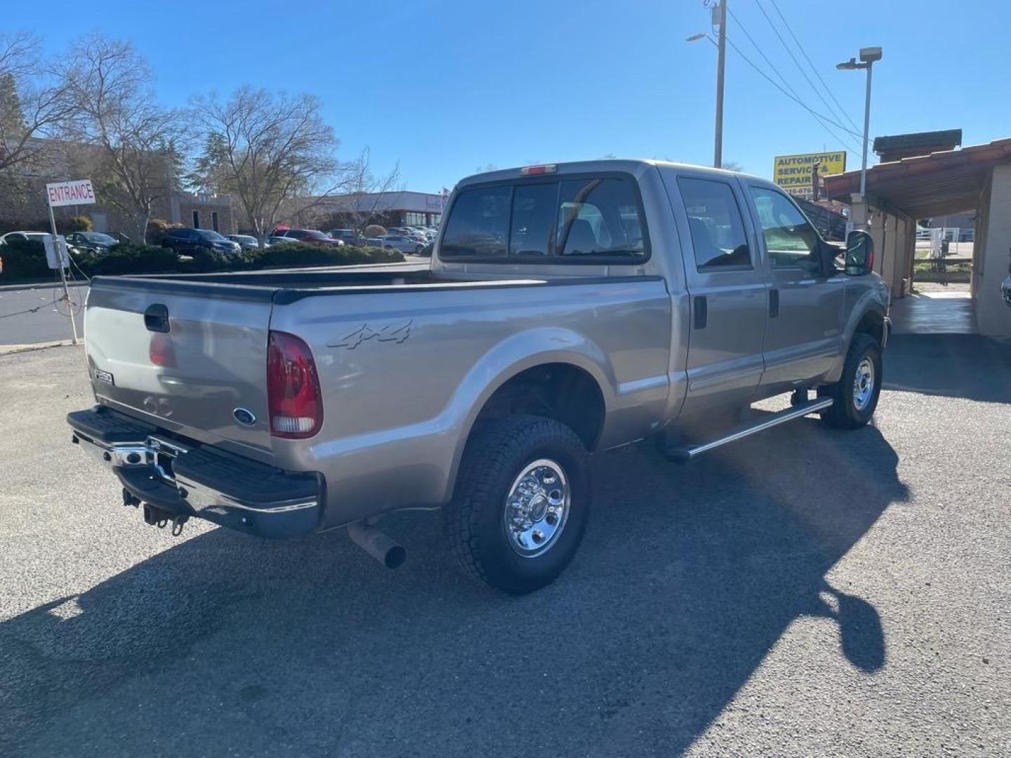 2004 Arizona Beige Clearcoat Metallic Ford F-250 Super Duty XLT (1FTNW21P04E) with an Power Stroke 6.0L Diesel Turbo V8 325hp 560ft. lbs. Other engine, 5-Speed Automatic transmission, located at 800 Riverside Ave, Roseville, CA, 95678, 916-773-4549 & Toll Free: 866-719-4393, 38.732265, -121.291039 - DIESEL CREW CAB 4X4 XLT LOW MILES SERVICE RECORDS - Photo#3