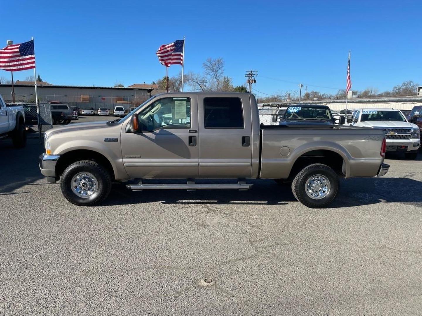 2004 Arizona Beige Clearcoat Metallic Ford F-250 Super Duty XLT (1FTNW21P04E) with an Power Stroke 6.0L Diesel Turbo V8 325hp 560ft. lbs. Other engine, 5-Speed Automatic transmission, located at 800 Riverside Ave, Roseville, CA, 95678, 916-773-4549 & Toll Free: 866-719-4393, 38.732265, -121.291039 - DIESEL CREW CAB 4X4 XLT LOW MILES SERVICE RECORDS - Photo#4