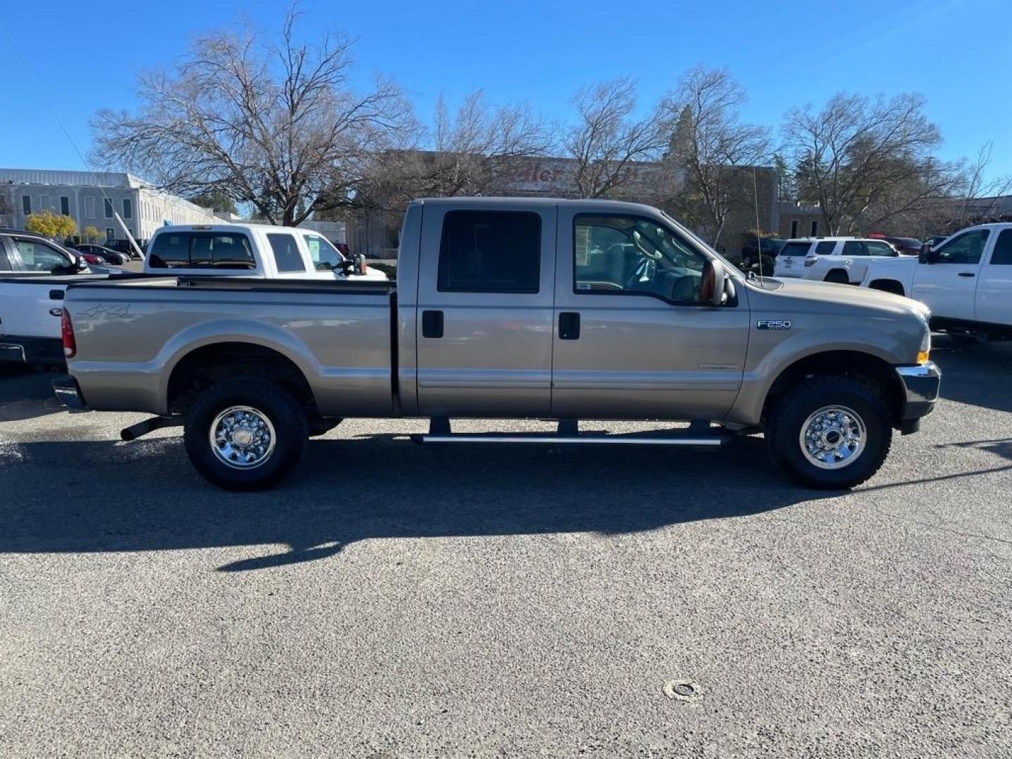 2004 Arizona Beige Clearcoat Metallic Ford F-250 Super Duty XLT (1FTNW21P04E) with an Power Stroke 6.0L Diesel Turbo V8 325hp 560ft. lbs. Other engine, 5-Speed Automatic transmission, located at 800 Riverside Ave, Roseville, CA, 95678, 916-773-4549 & Toll Free: 866-719-4393, 38.732265, -121.291039 - DIESEL CREW CAB 4X4 XLT LOW MILES SERVICE RECORDS - Photo#5